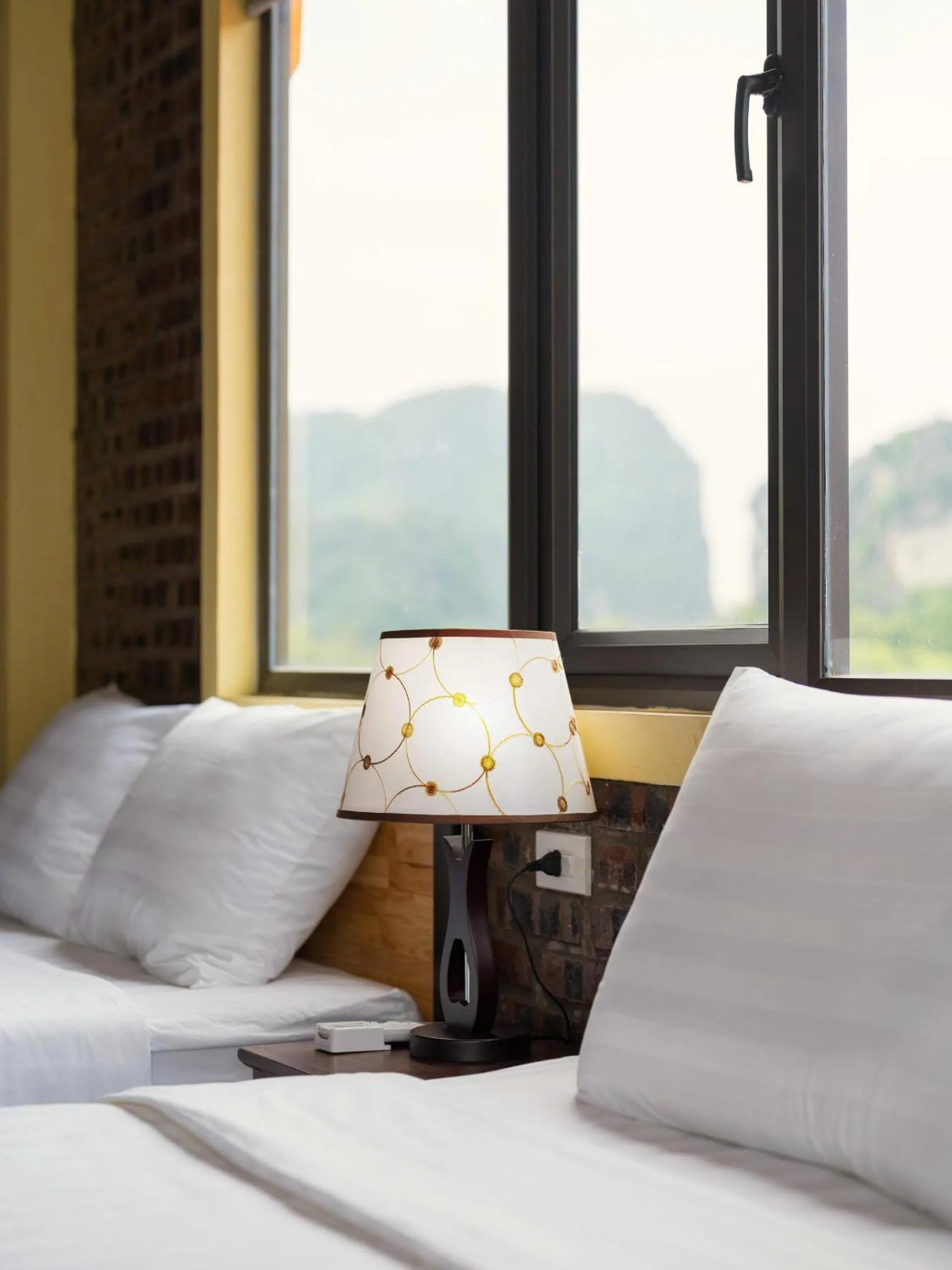 Bed in Cozy Son Hotel