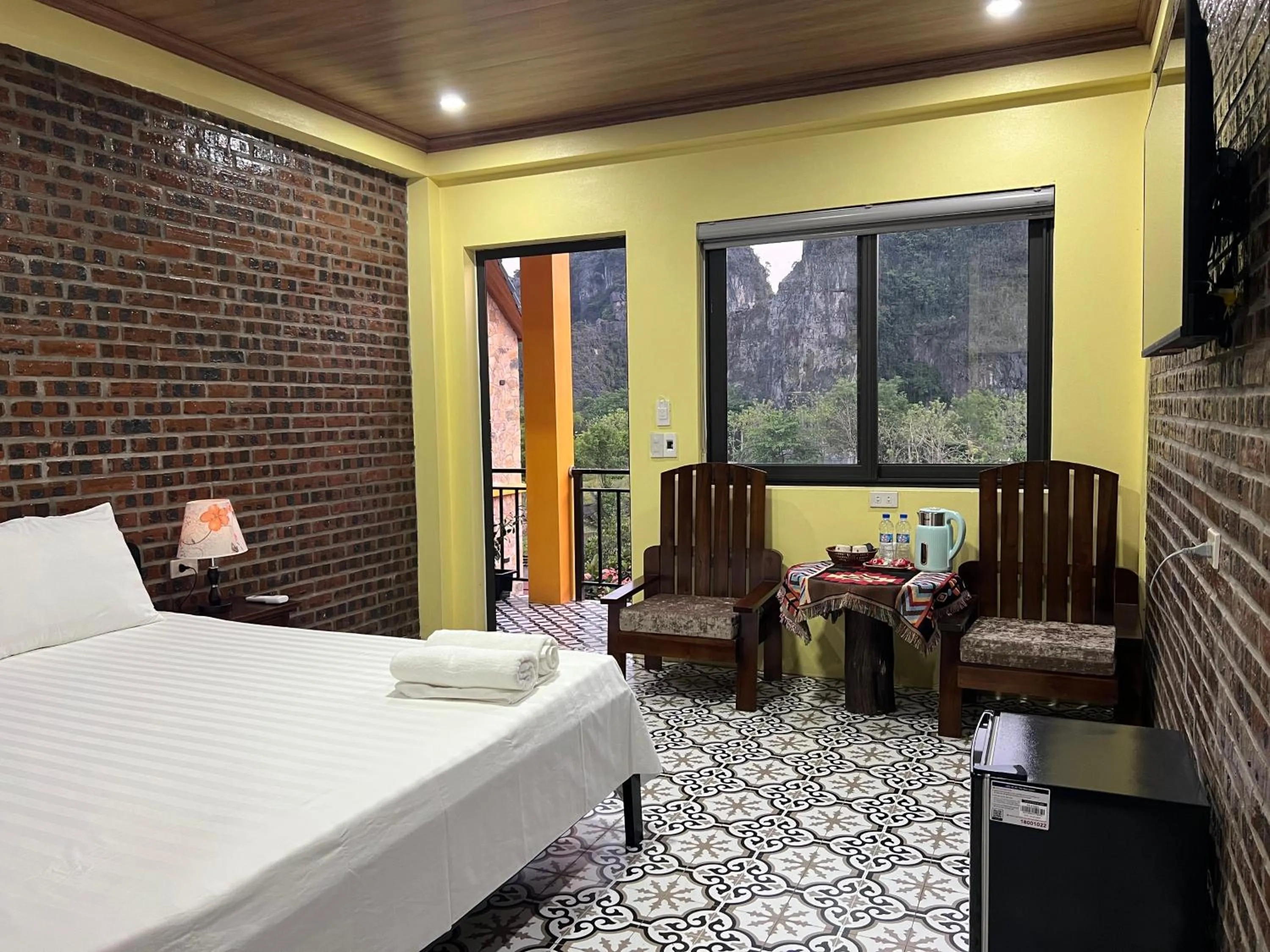 Bed in Cozy Son Hotel