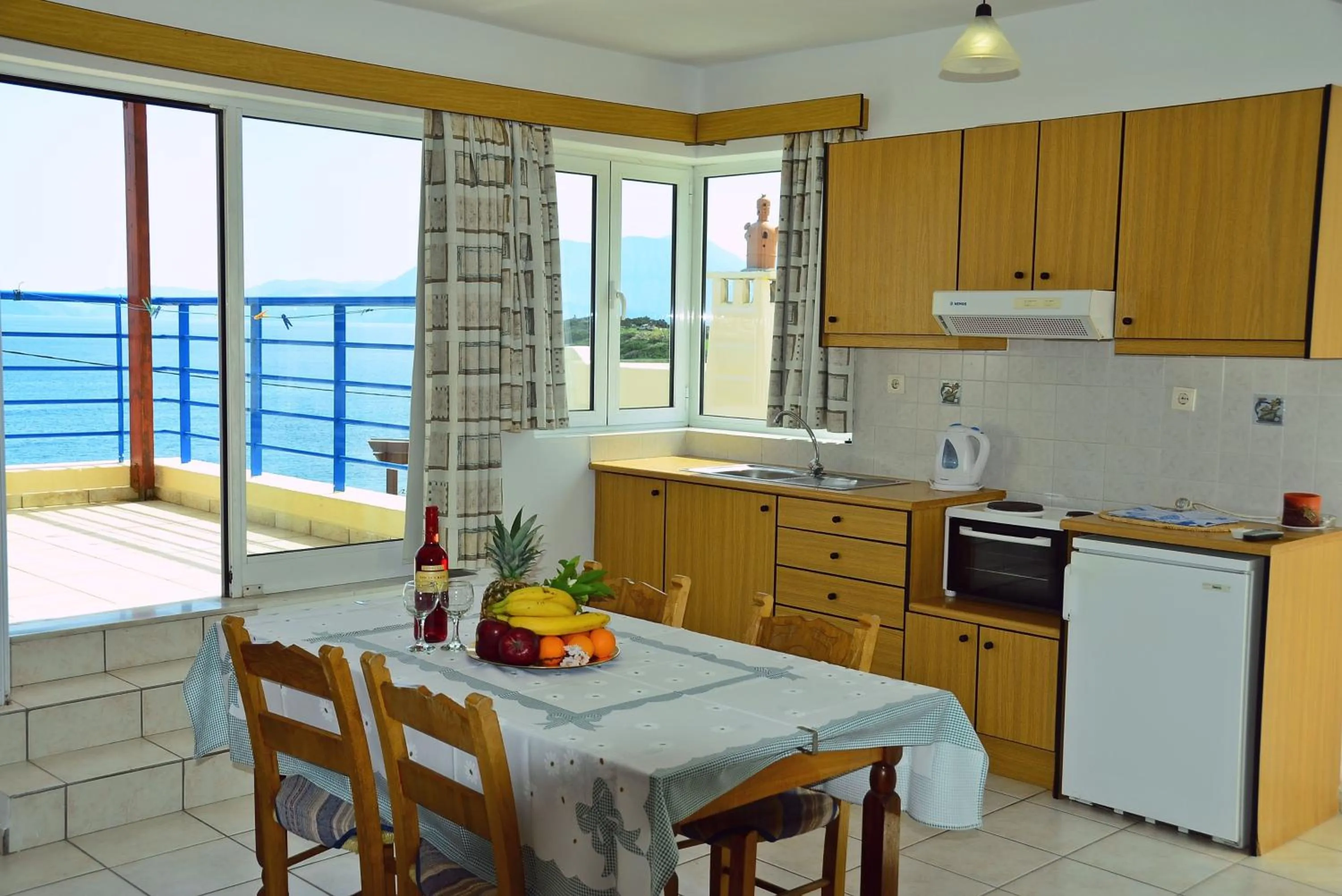 Kitchen or kitchenette in Poppy Villas