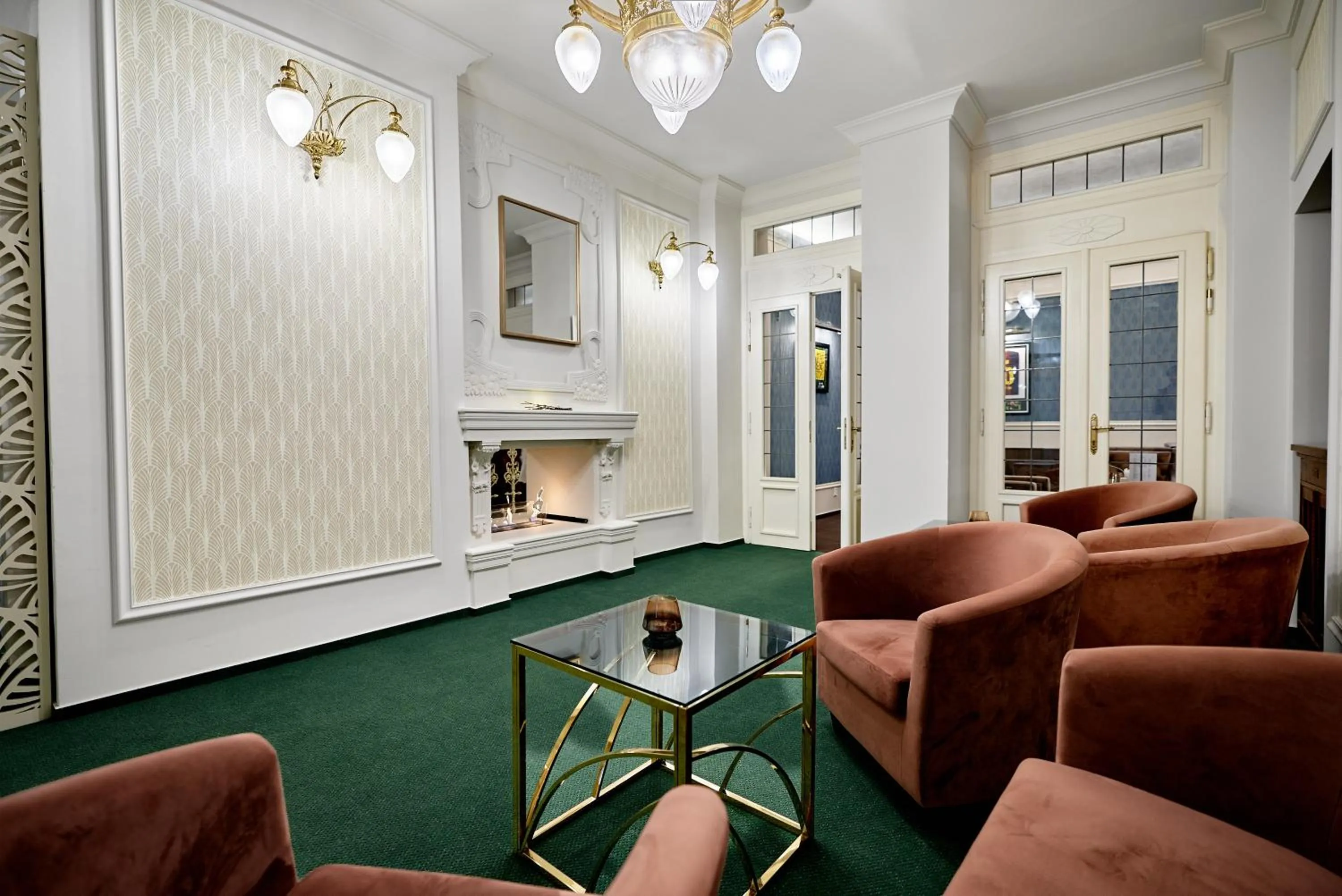 Communal lounge/ TV room in Hotel Maxim