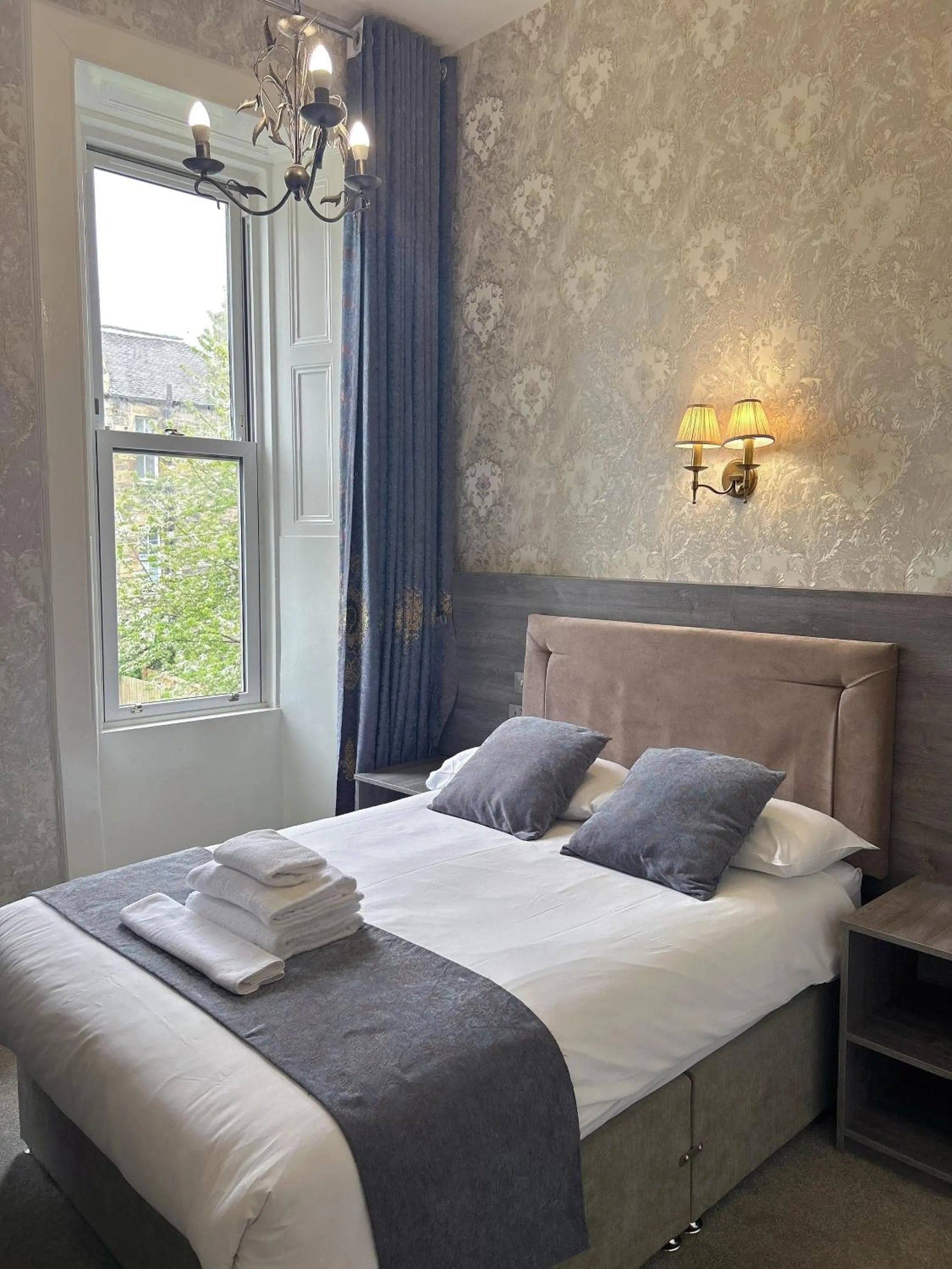 Bed in Alexander Guest House