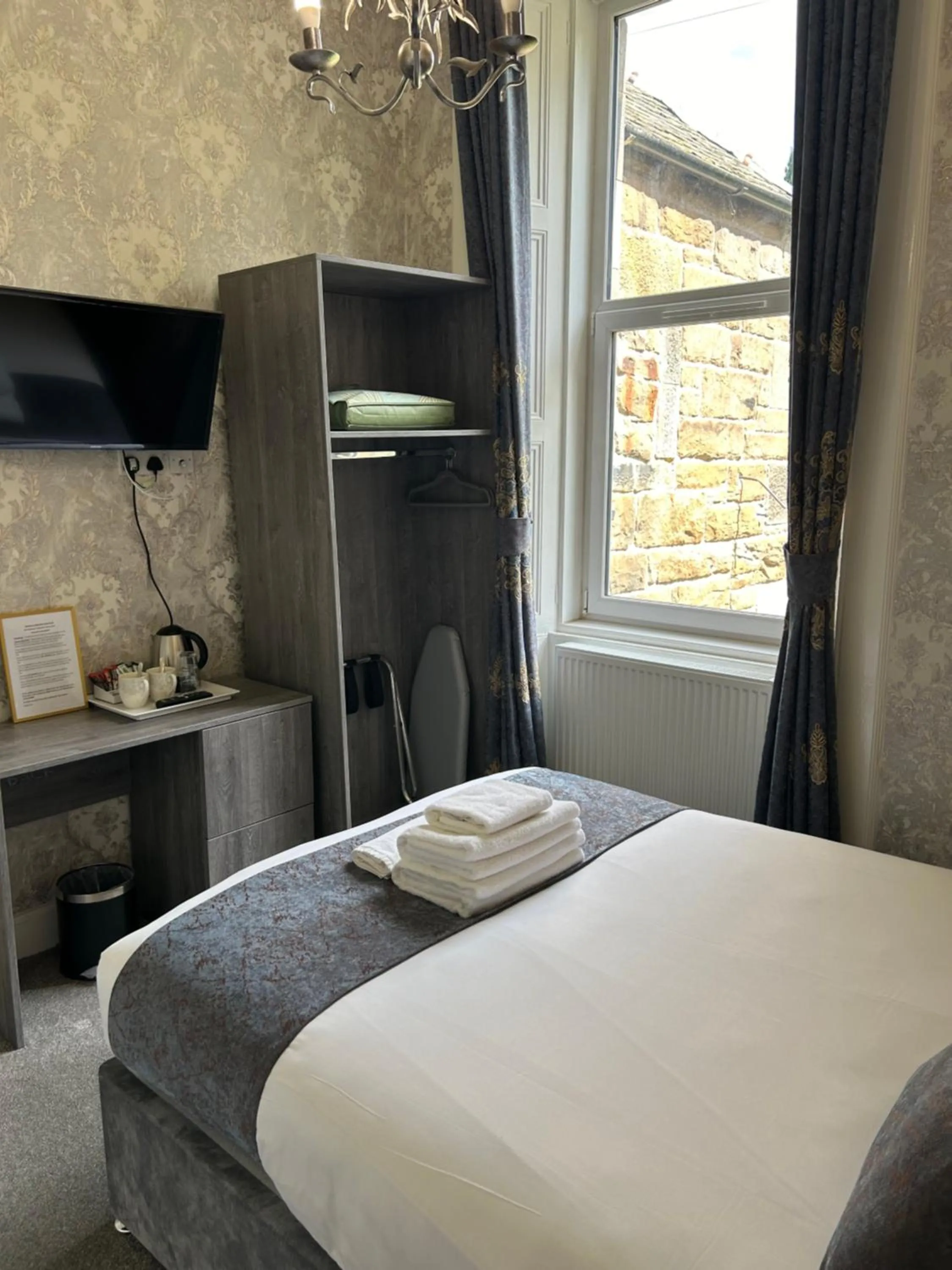 Bed in Alexander Guest House