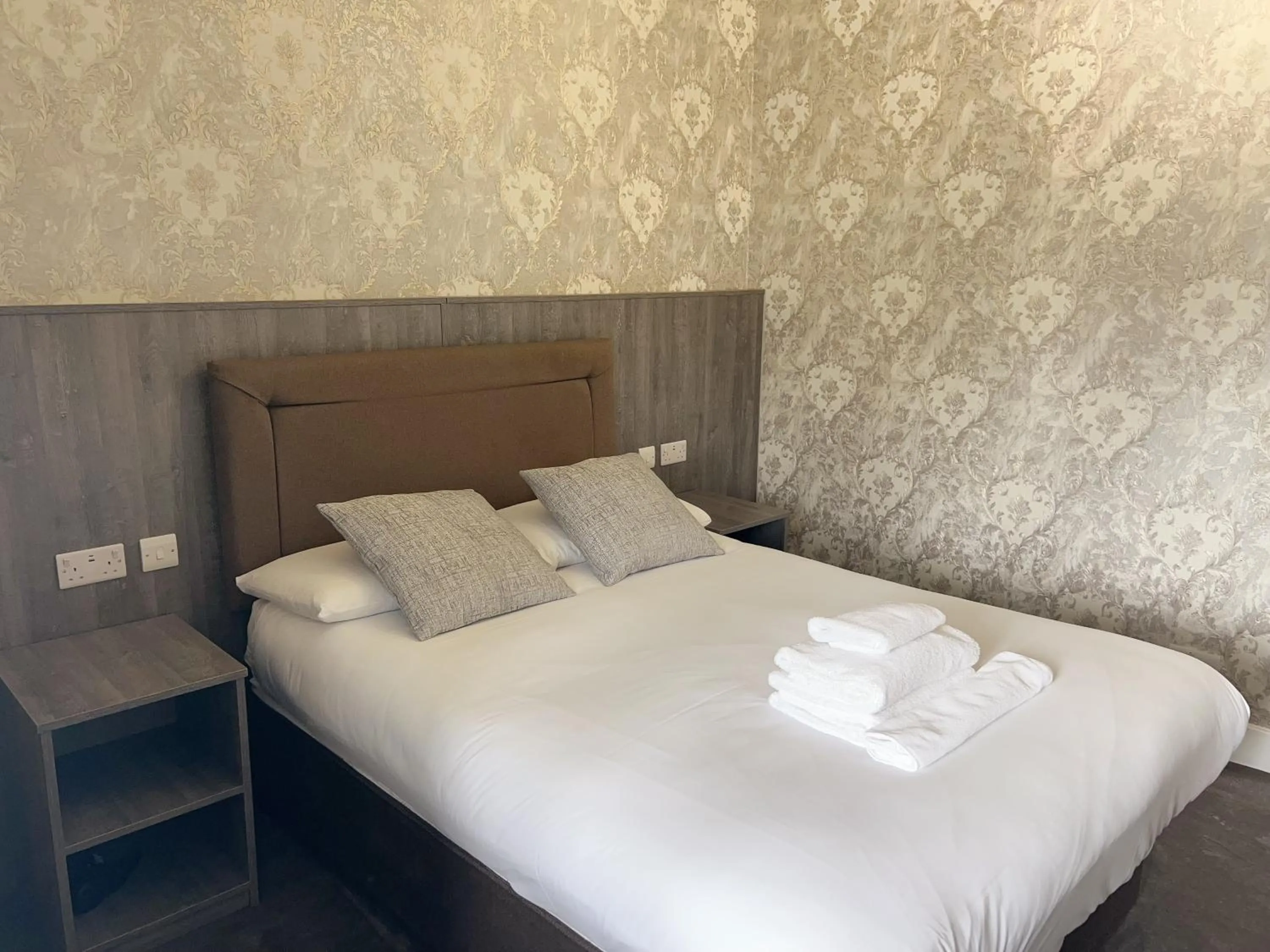 Bed in Alexander Guest House