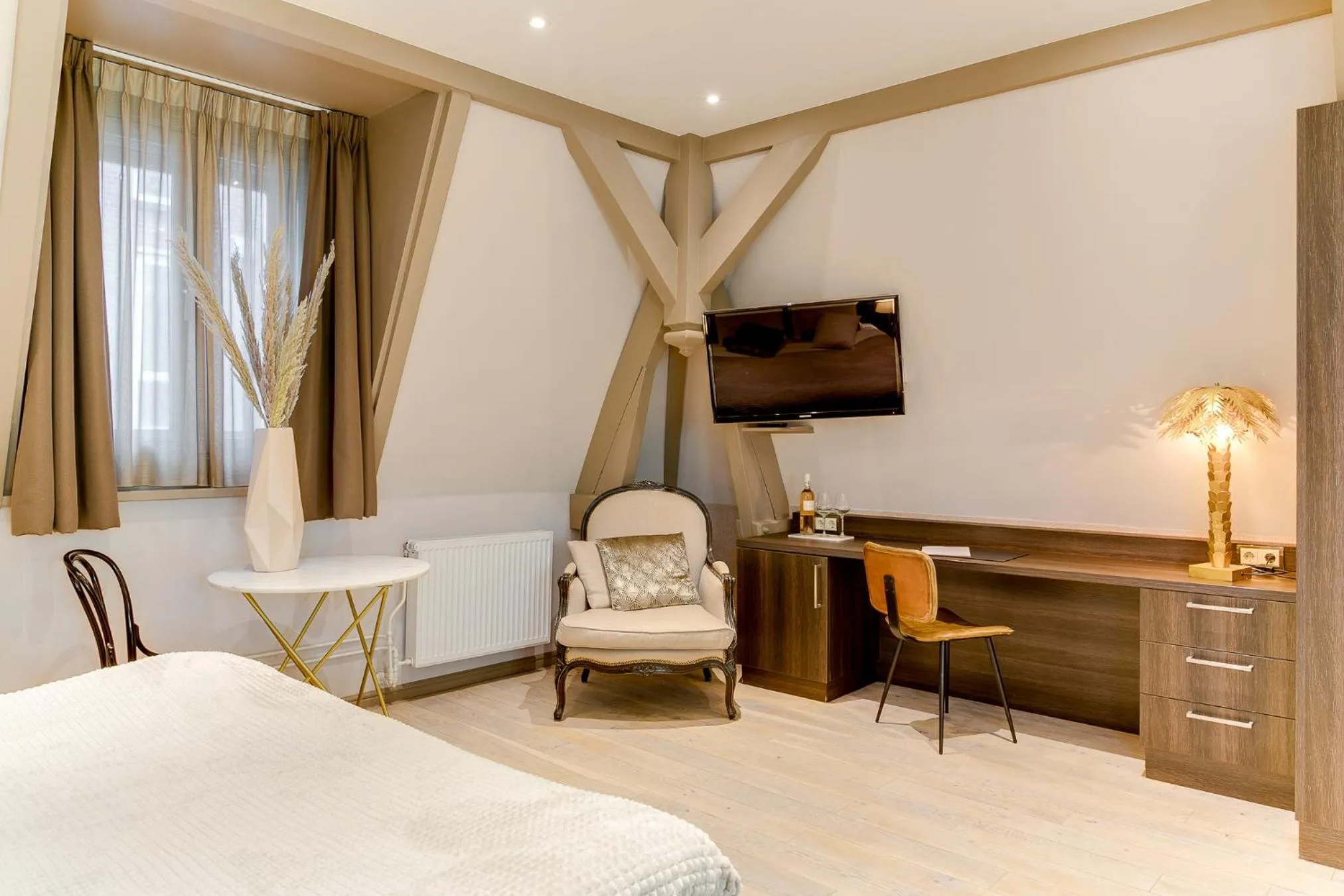 Photo of the whole room, Bed in Brasss Hotel Suites