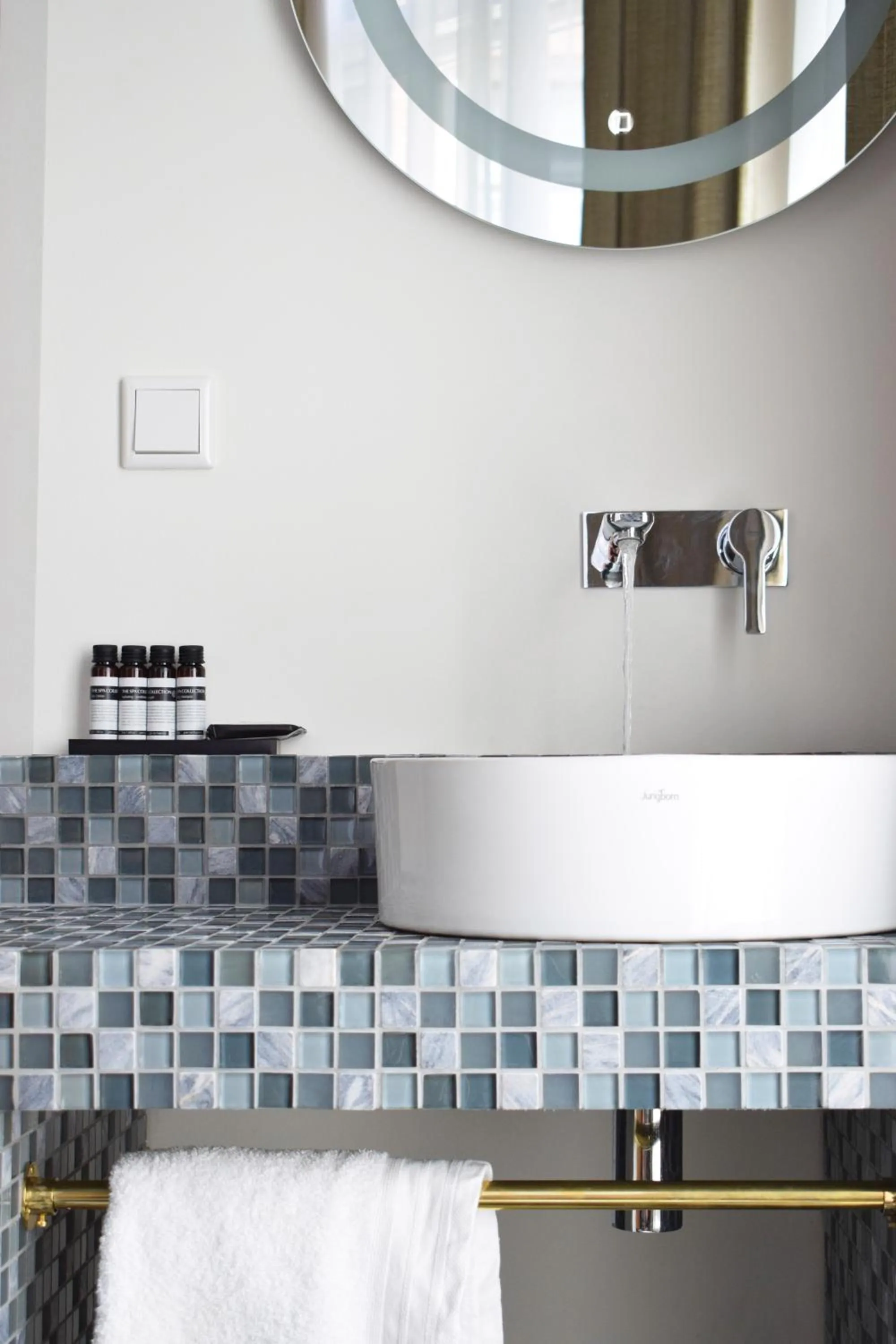 Bathroom in Brasss Hotel Suites