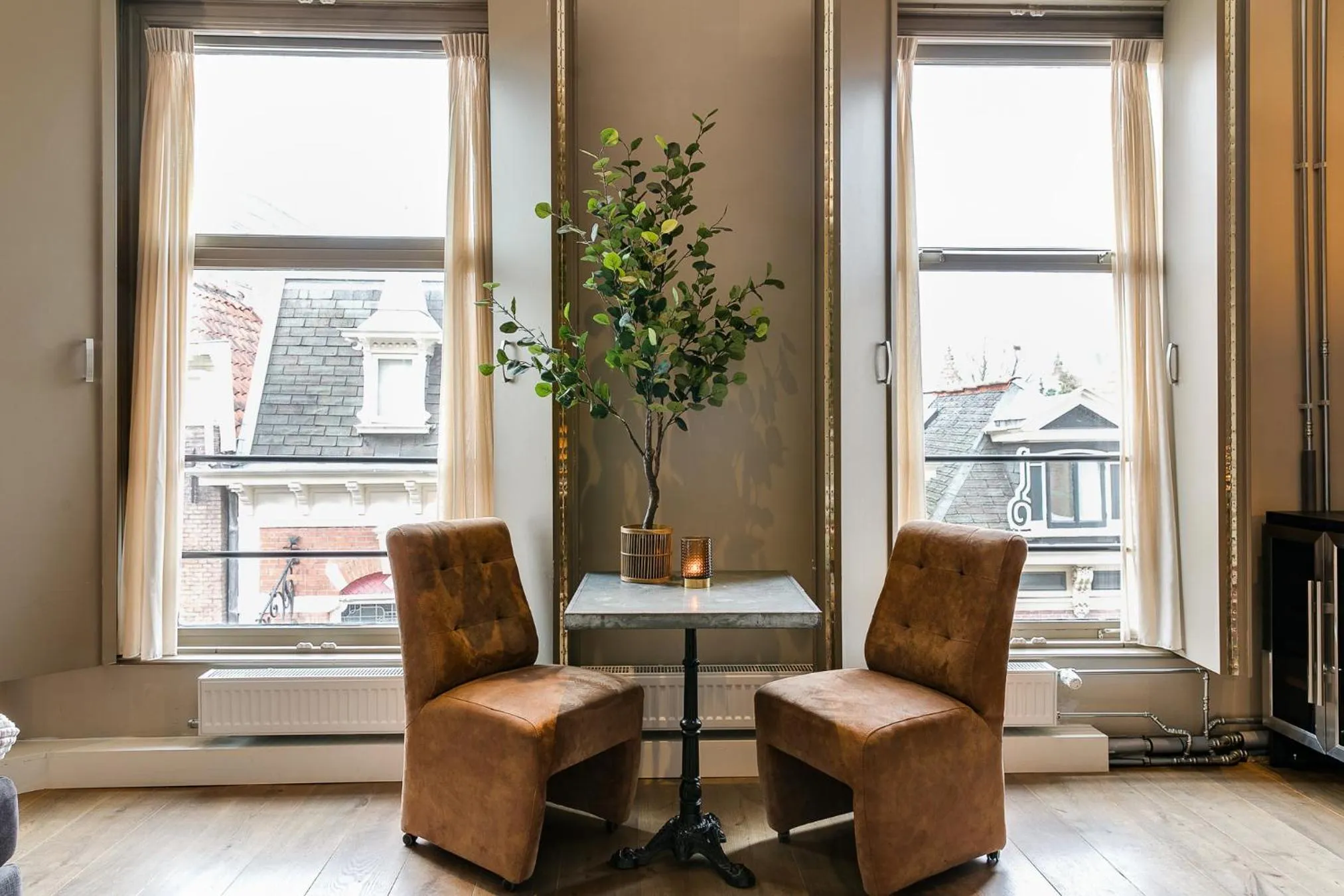 Seating area in Brasss Hotel Suites