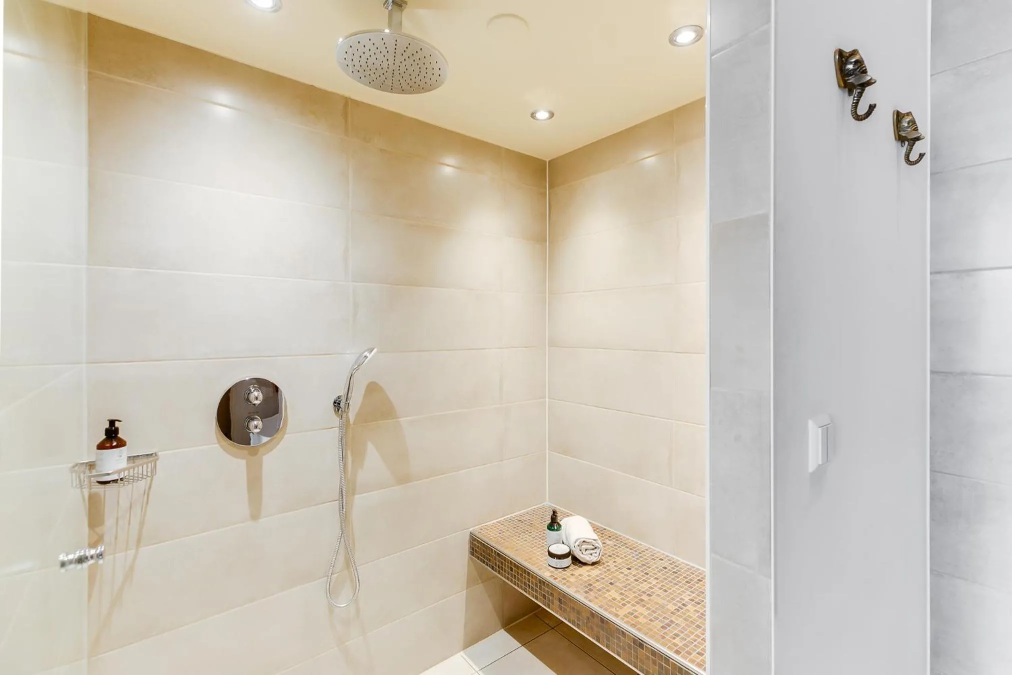 Bathroom in Brasss Hotel Suites