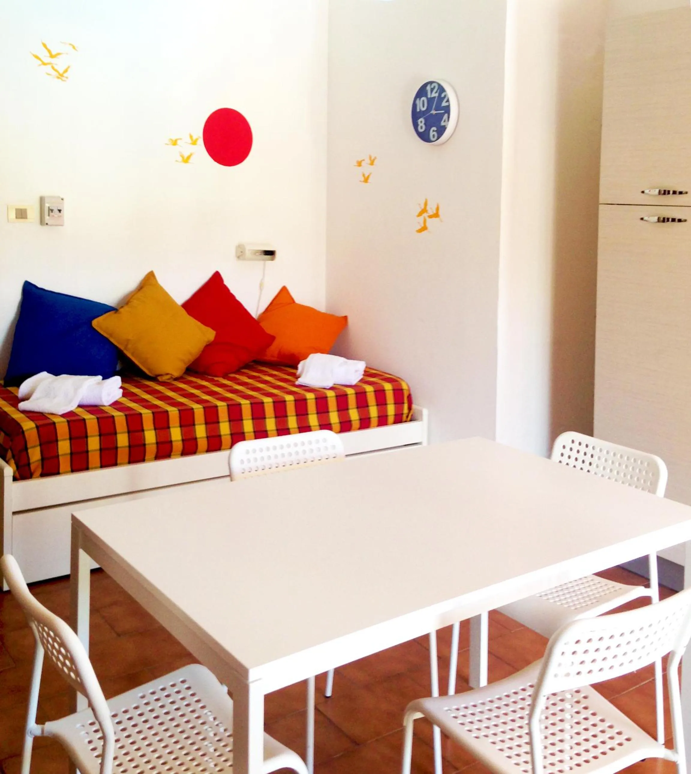 Living room, Bed in Residence La Giungla