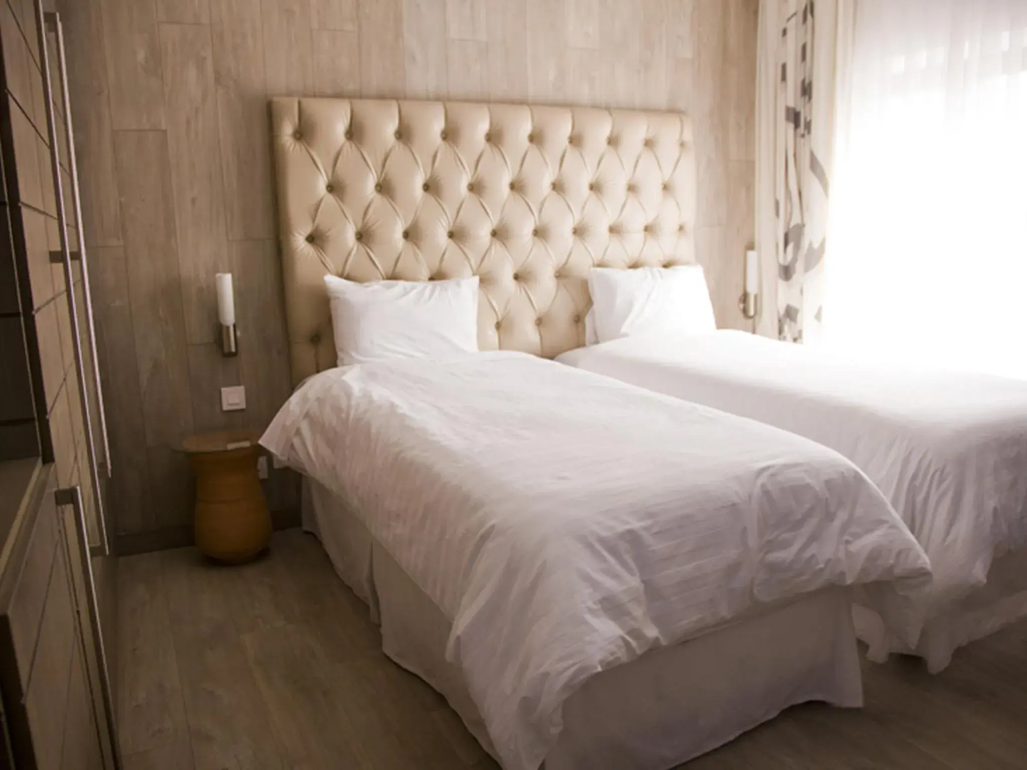 Bed in La Locanda Boutique Hotel