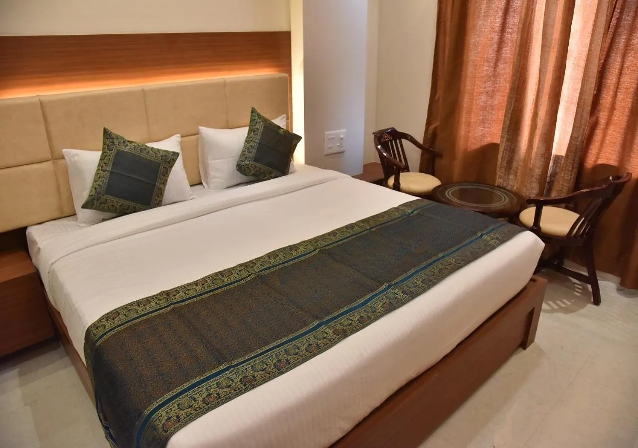 Bed in Hotel Rk Grand
