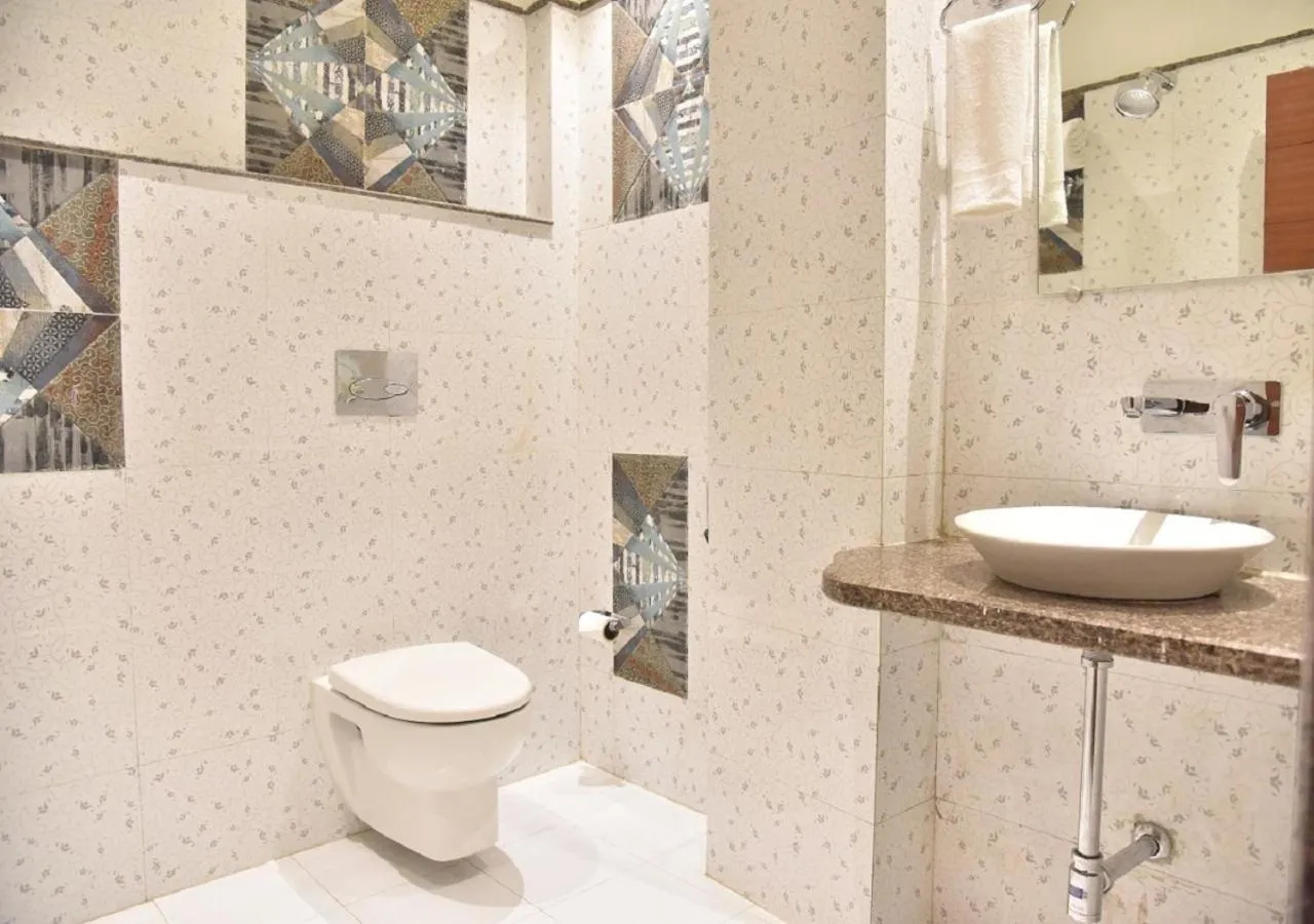 Bathroom in Hotel Rk Grand