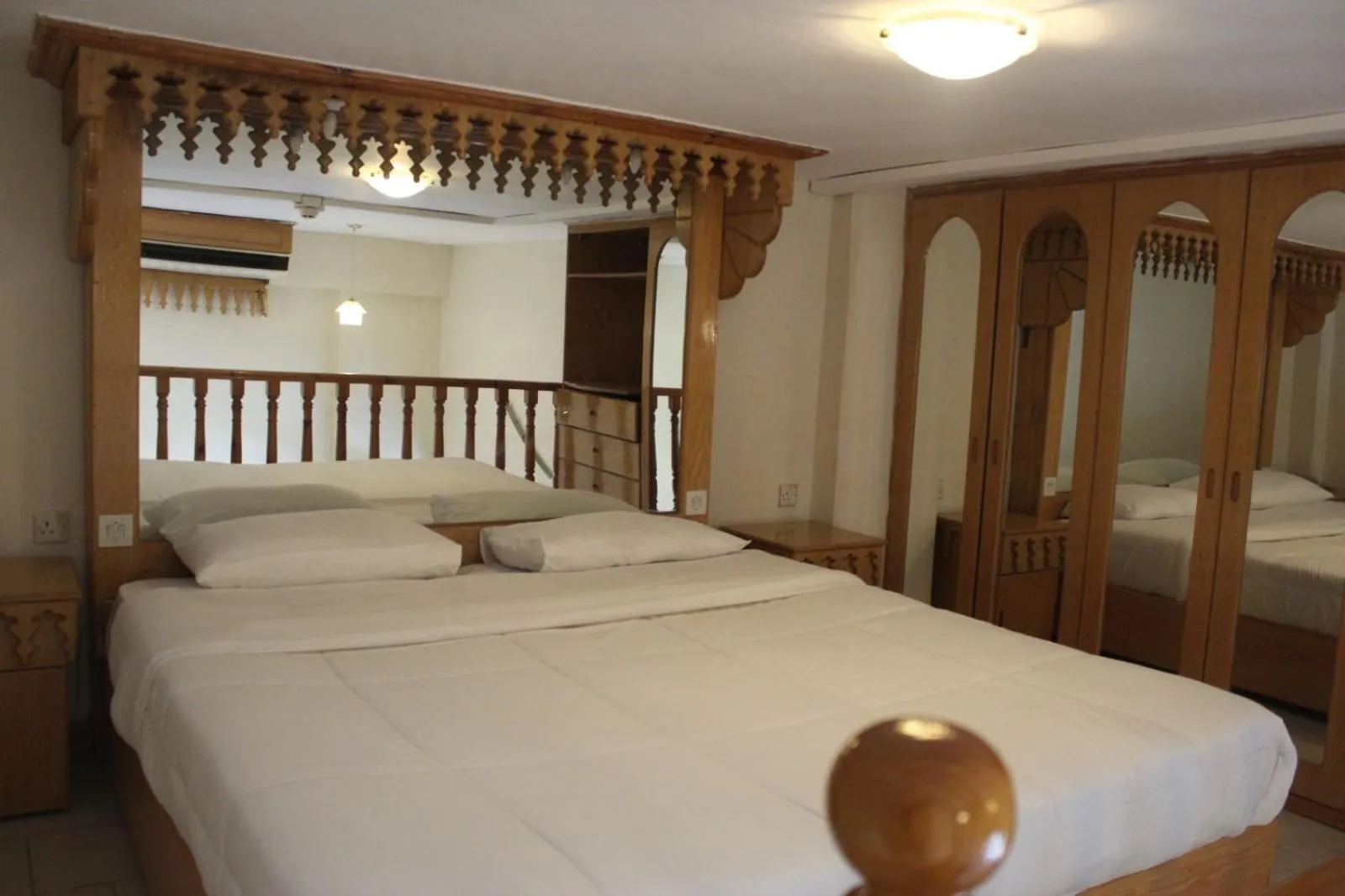 Bed in Kuwait Palace Hotel