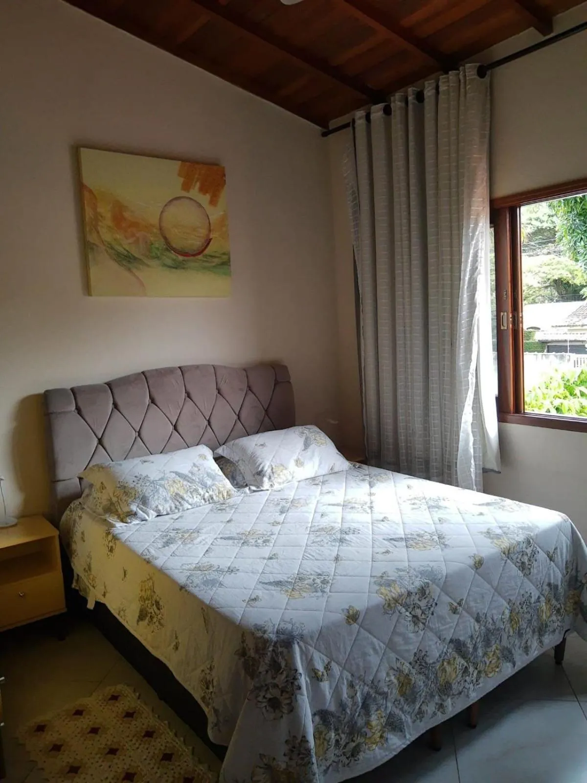 Bed in ACIOLY'S BEACH HOUSE