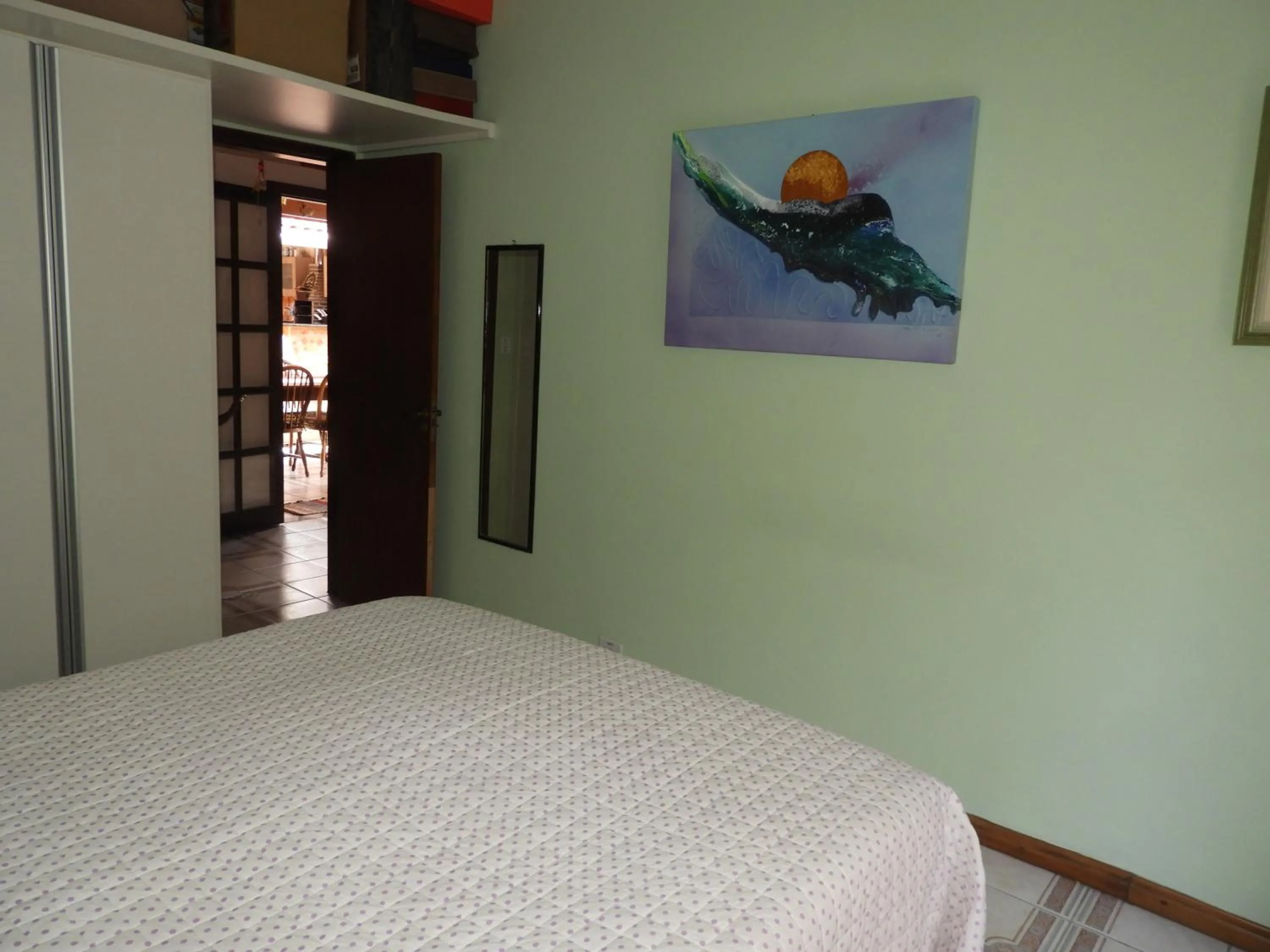 Bed in ACIOLY'S BEACH HOUSE