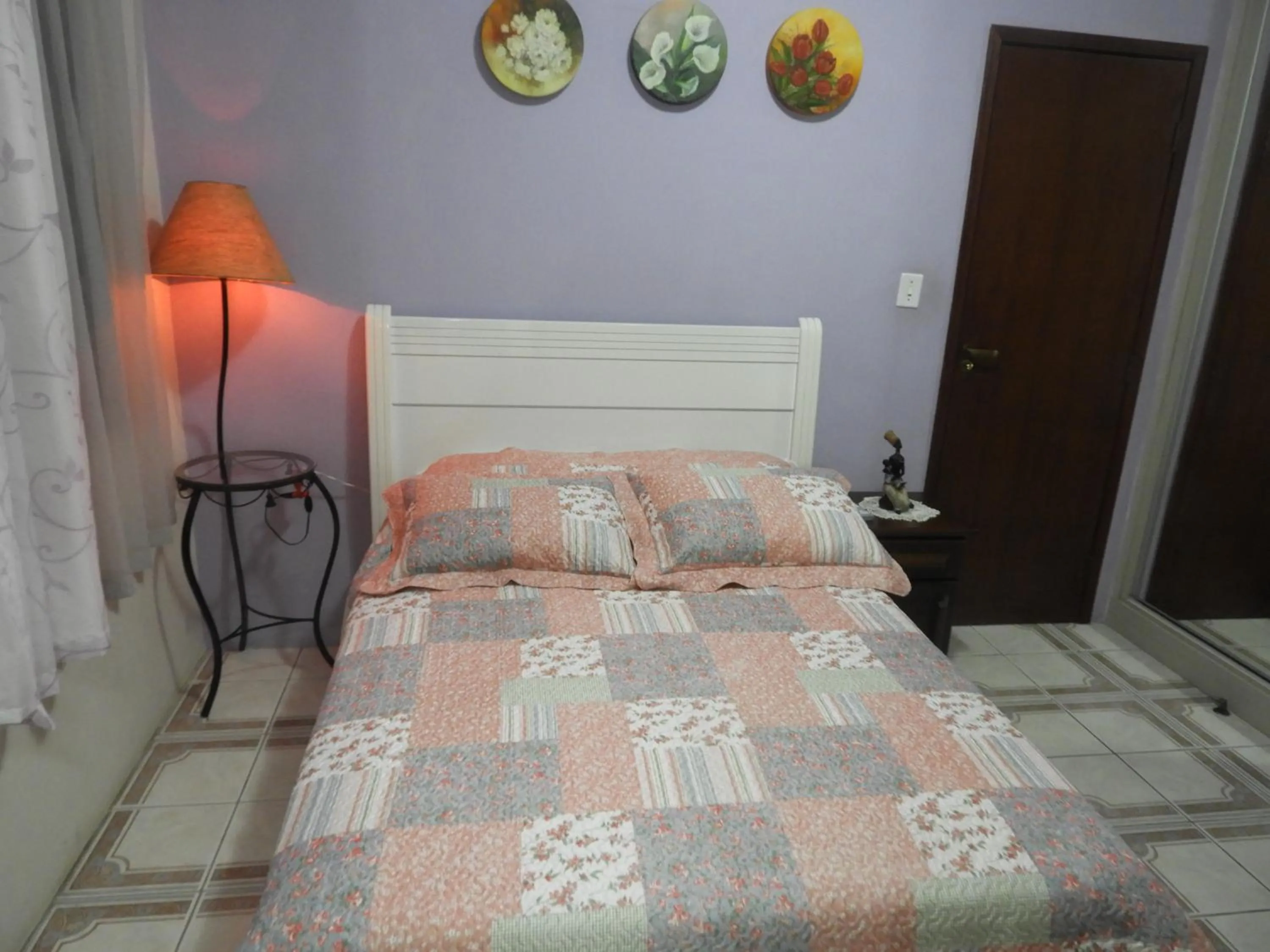 Bed in ACIOLY'S BEACH HOUSE