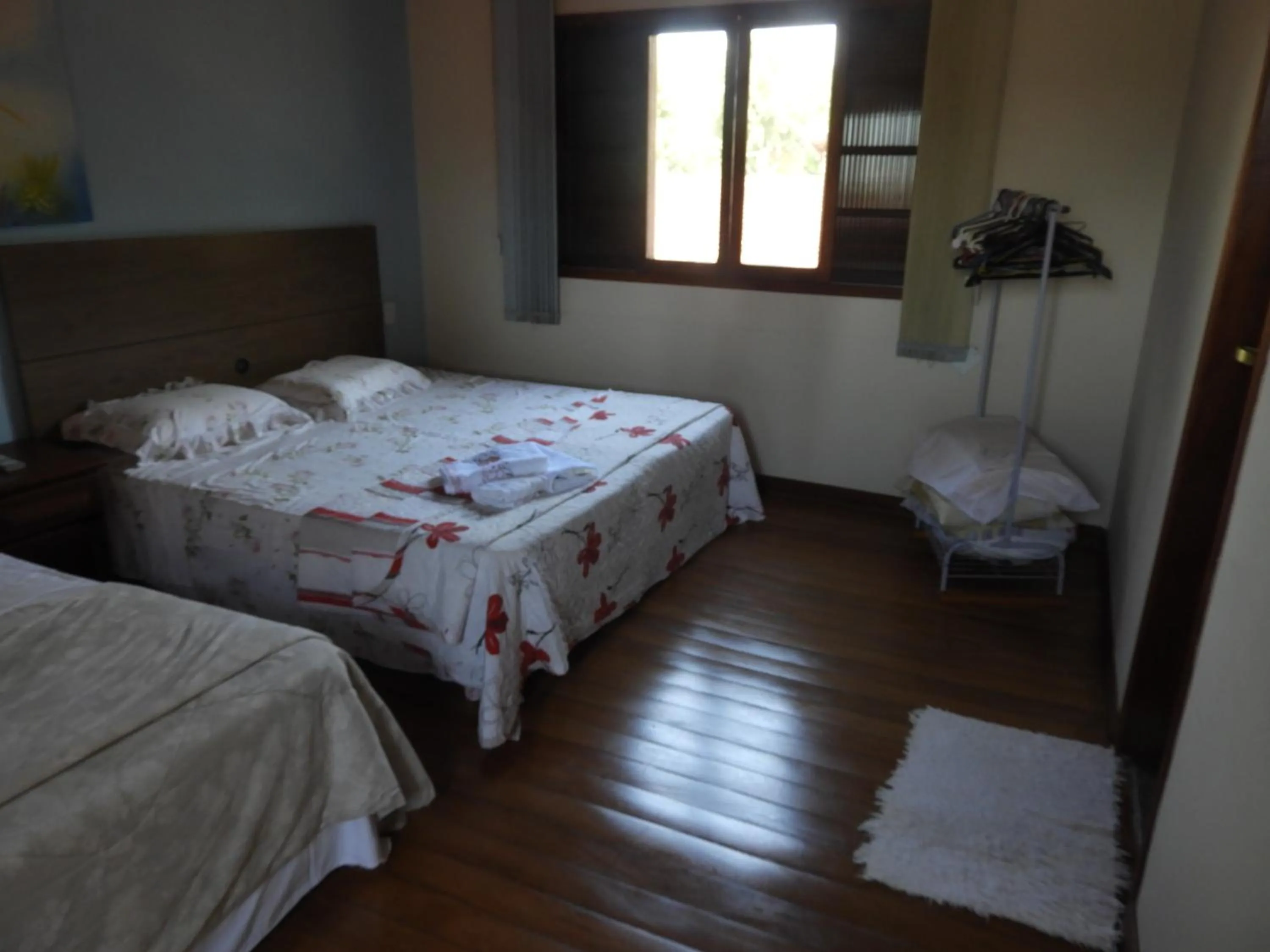 Bed in ACIOLY'S BEACH HOUSE