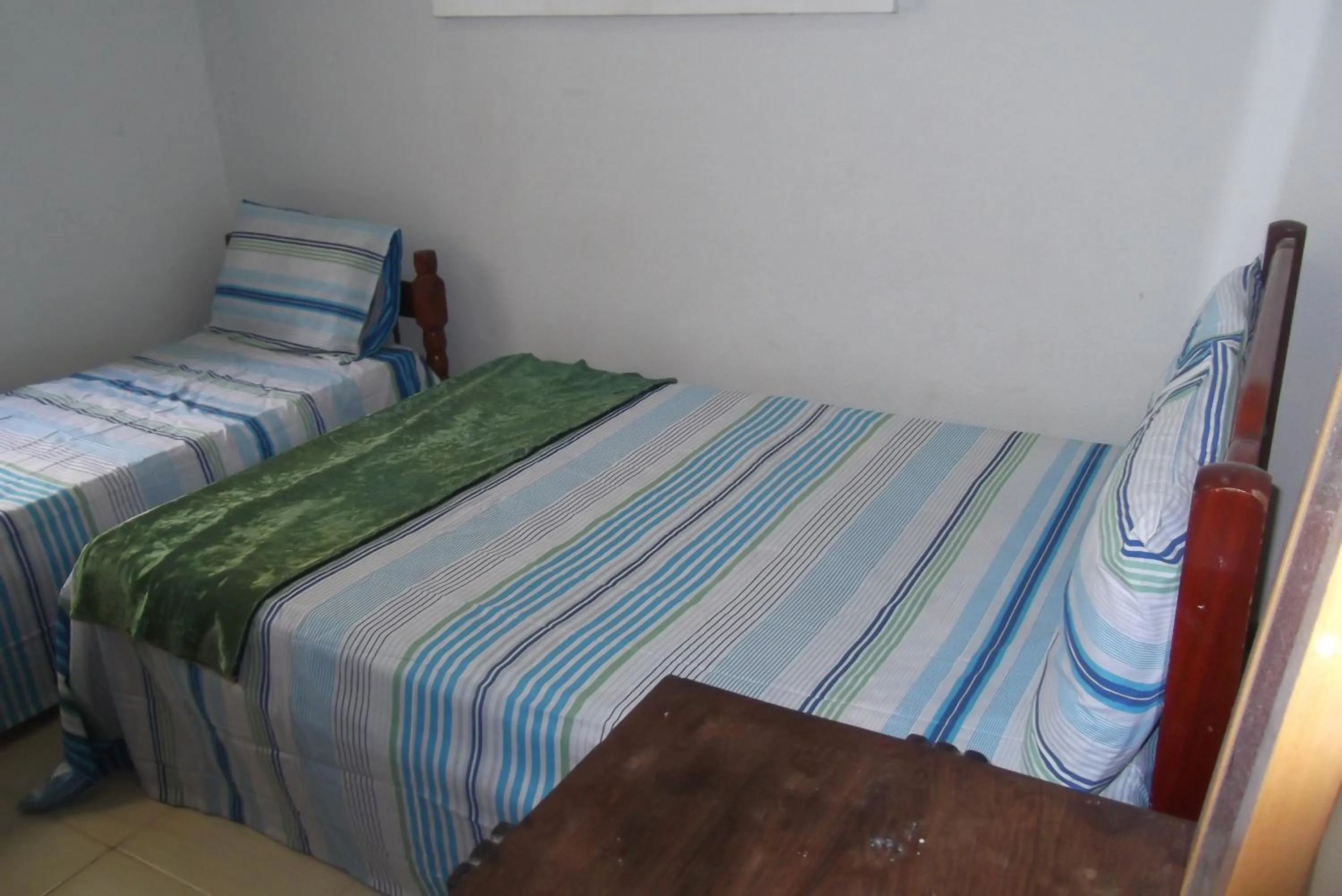 Bed in Tião Botelho Guest House