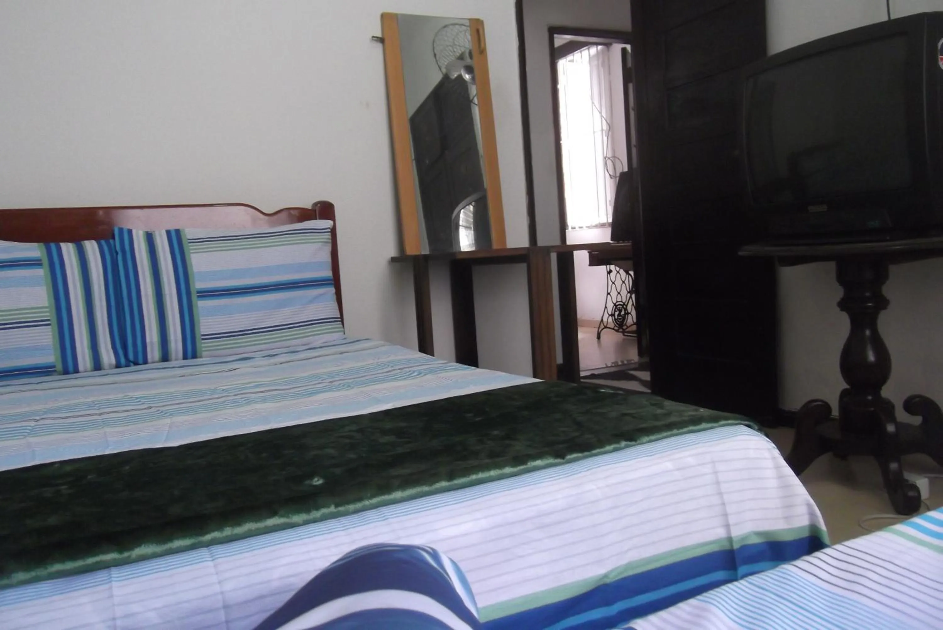 Bed in Tião Botelho Guest House