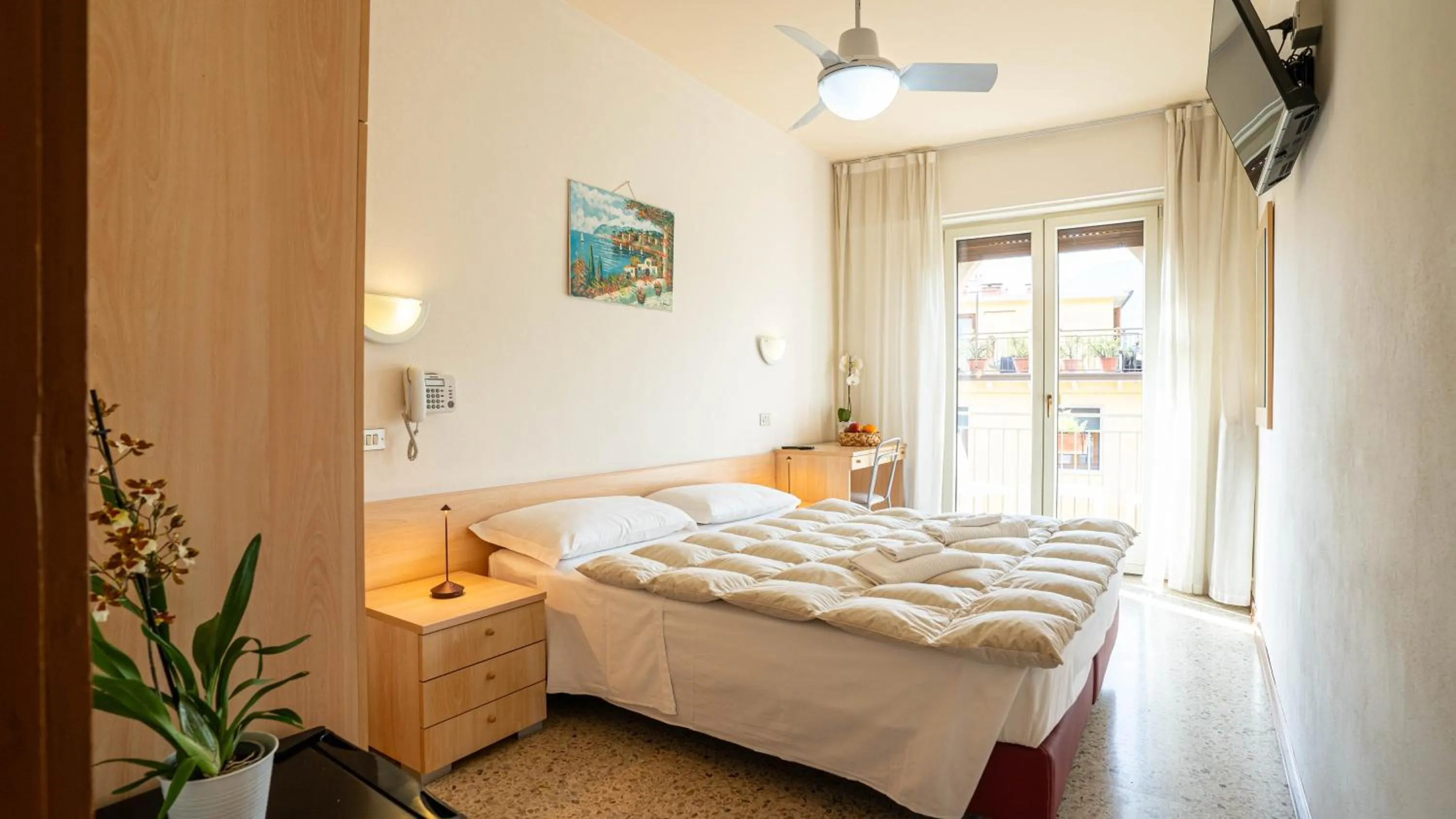 Bed in Hotel Sorriso