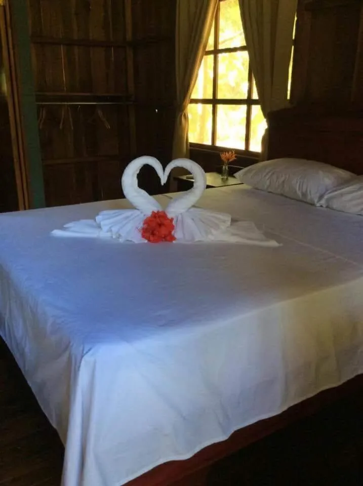 Bed in Hidden Paradise Lodge