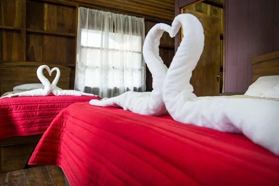 Bed in Hidden Paradise Lodge