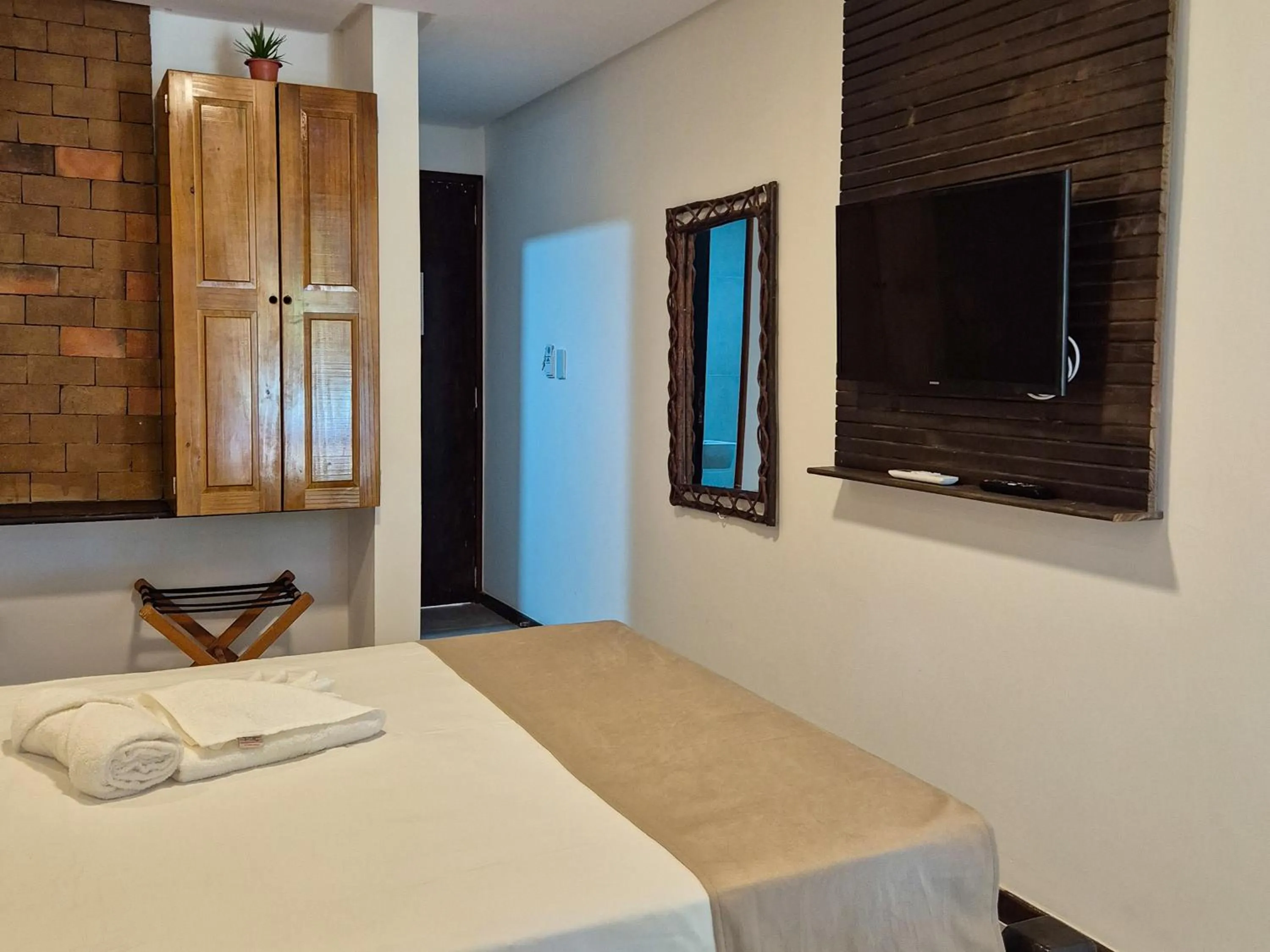 Bed in Pousada dos Coqueiros