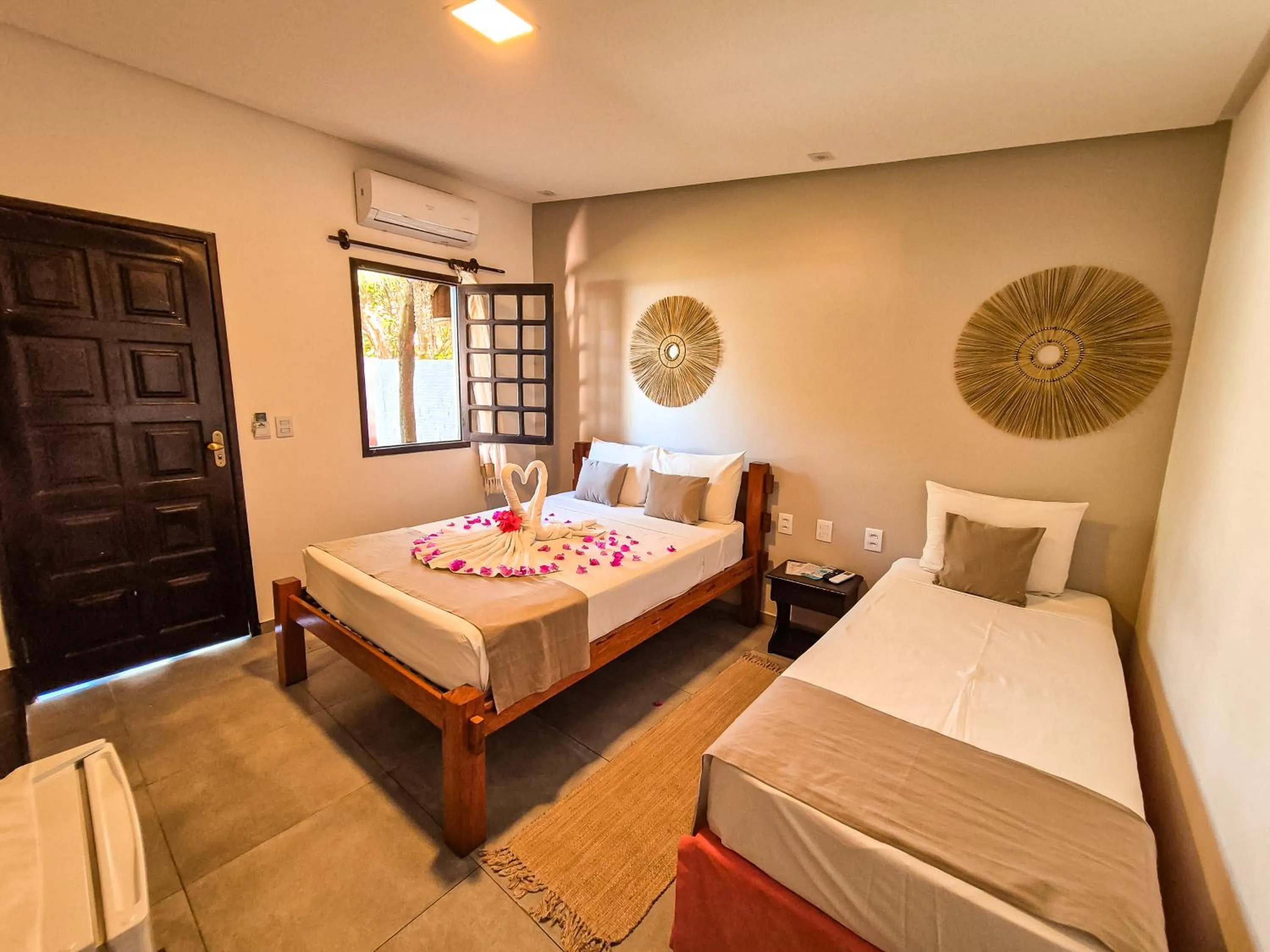 Bed in Pousada dos Coqueiros