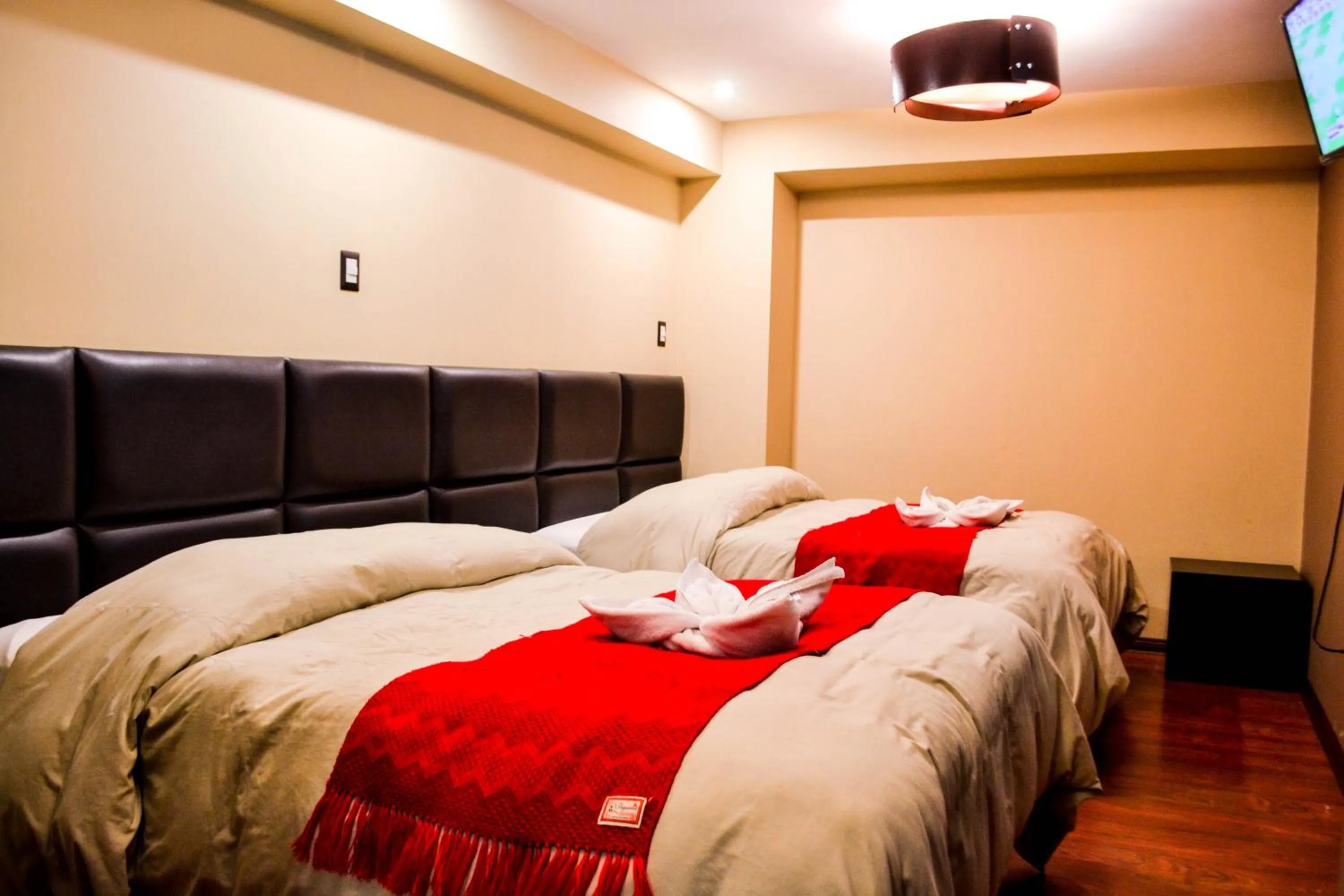 Bed in Hotel Royal Qosqo