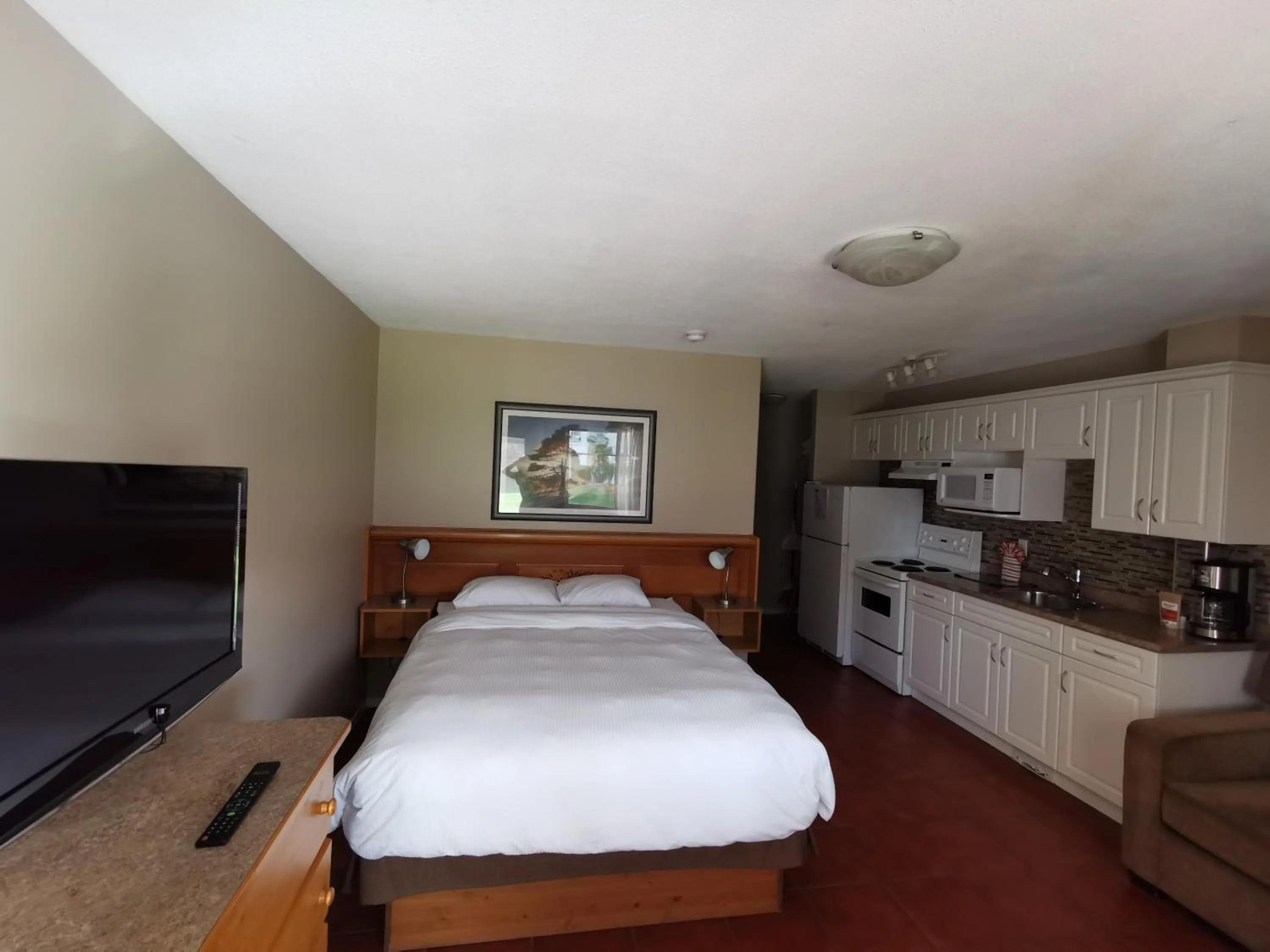 Bed in Sandy Beach Suites