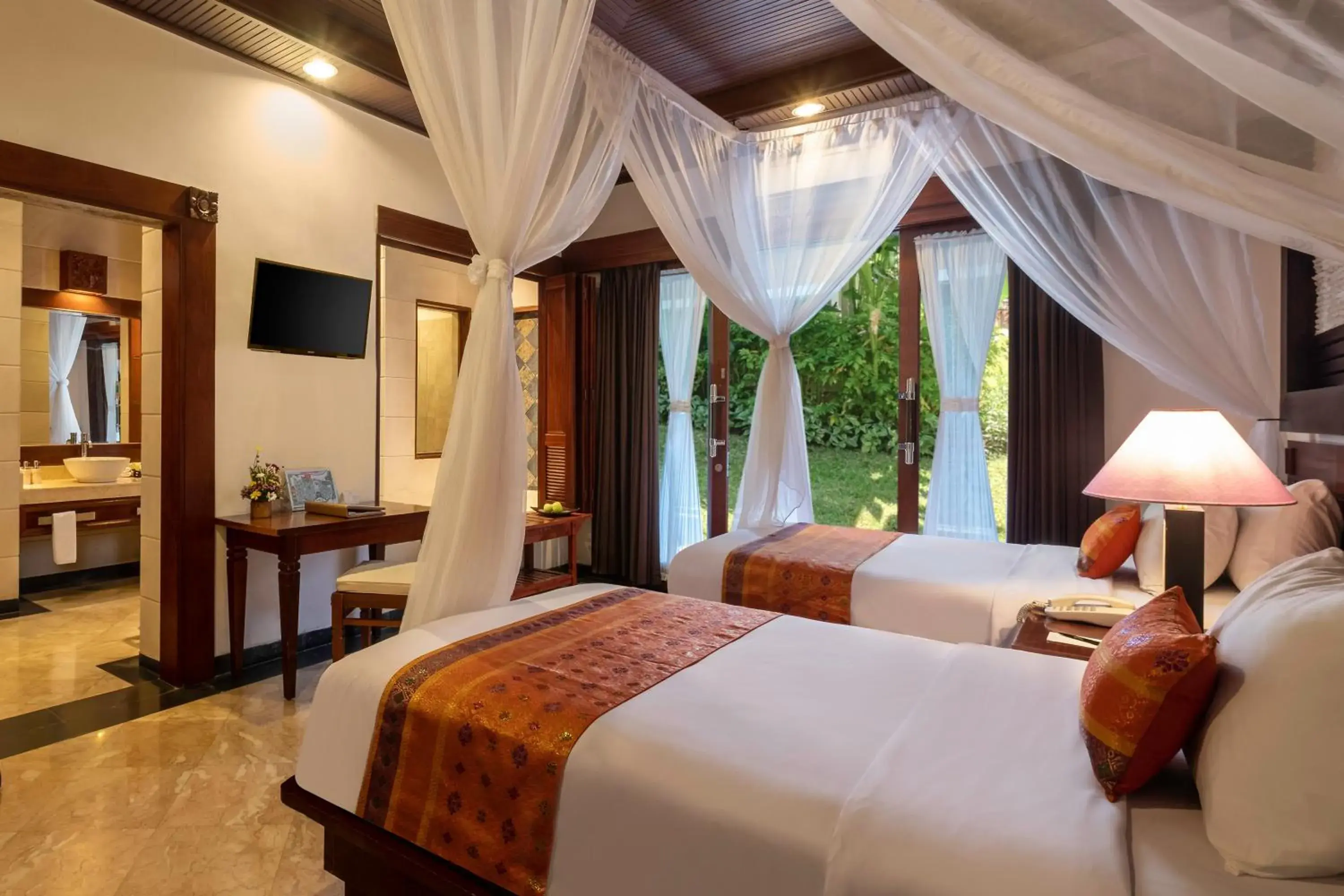 Bedroom, Bed in Bali Tropic Resort & Spa - CHSE Certified