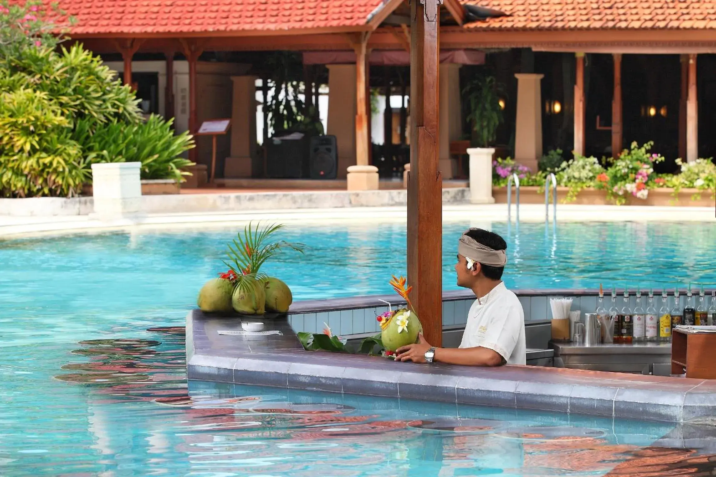 Lounge or bar, Swimming Pool in Bali Tropic Resort & Spa - CHSE Certified