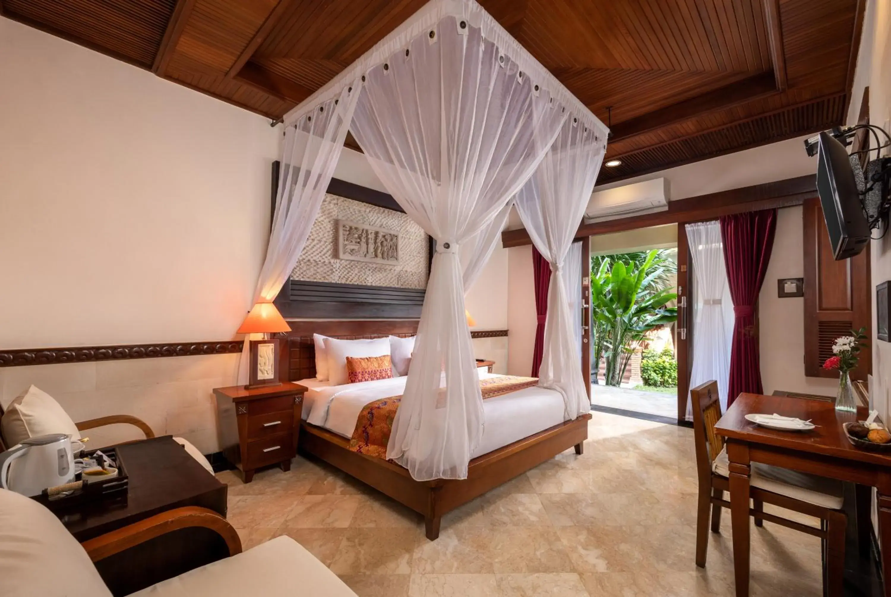 Bedroom, Bed in Bali Tropic Resort & Spa - CHSE Certified Bedroom, Bed in Bali Tropic Resort & Spa - CHSE Certified
