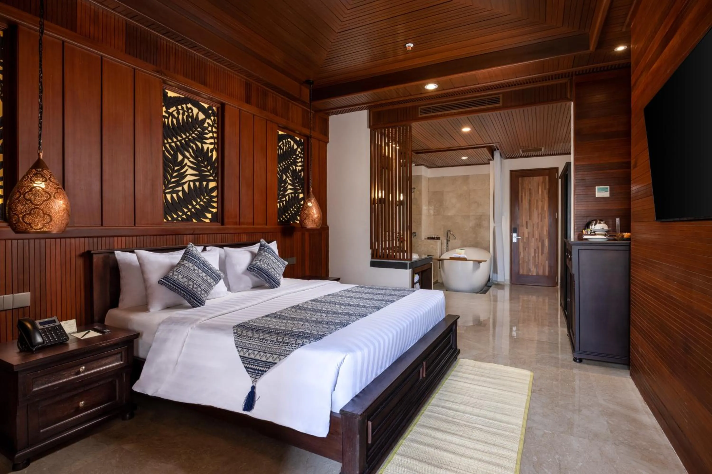 Bedroom, Bed in Bali Tropic Resort & Spa - CHSE Certified
