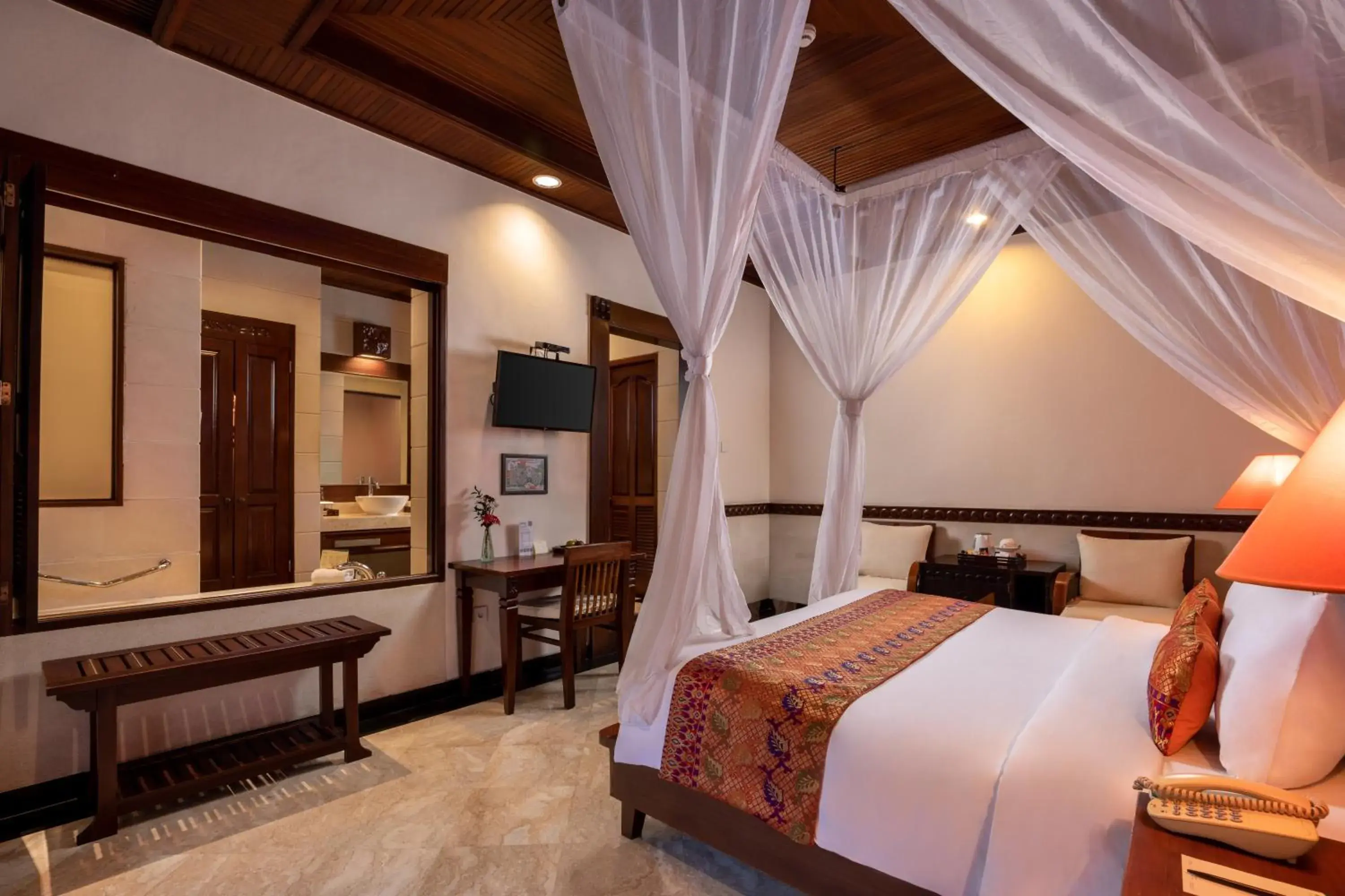 Bedroom, Bed in Bali Tropic Resort & Spa - CHSE Certified Bedroom, Bed in Bali Tropic Resort & Spa - CHSE Certified