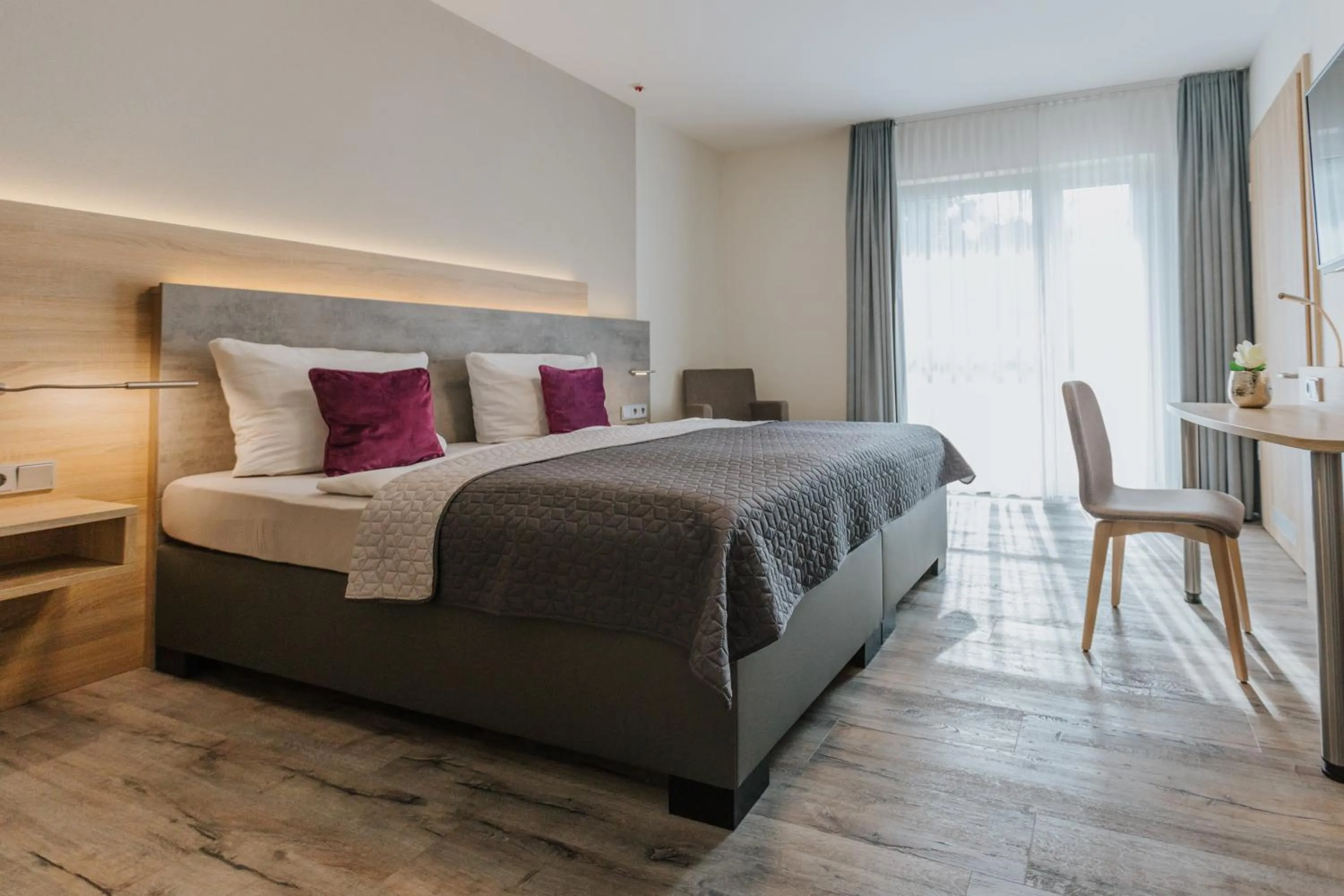 Bed in Casamia Hotel Spremberg