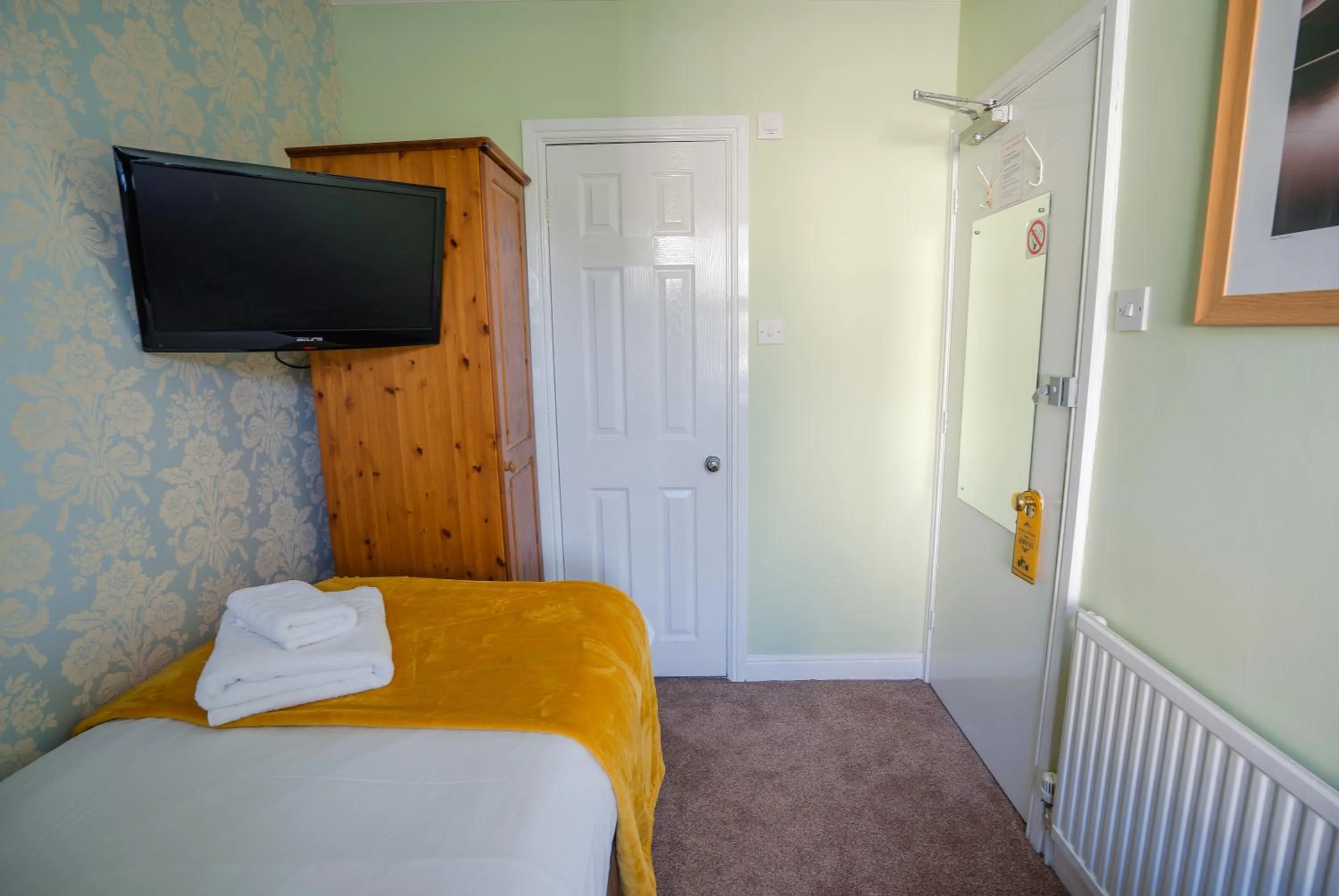 Photo of the whole room, Bed in The Cottage