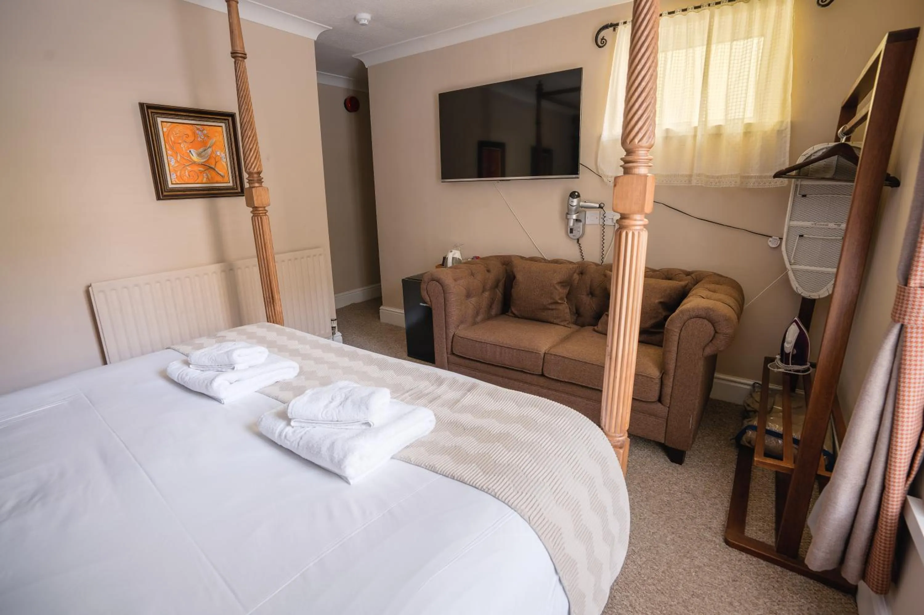 Photo of the whole room, Bed in The Cottage