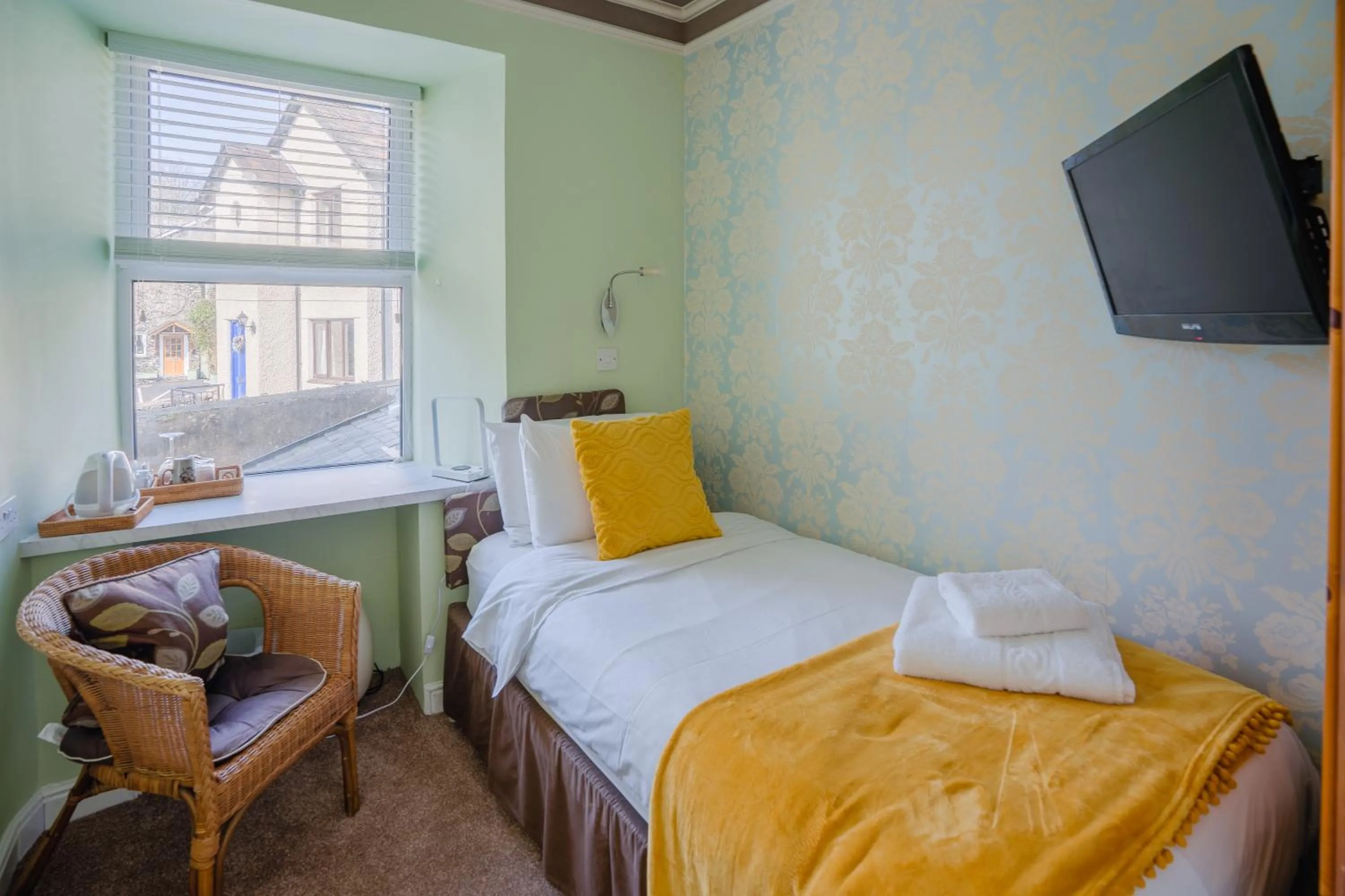 Photo of the whole room, Bed in The Cottage