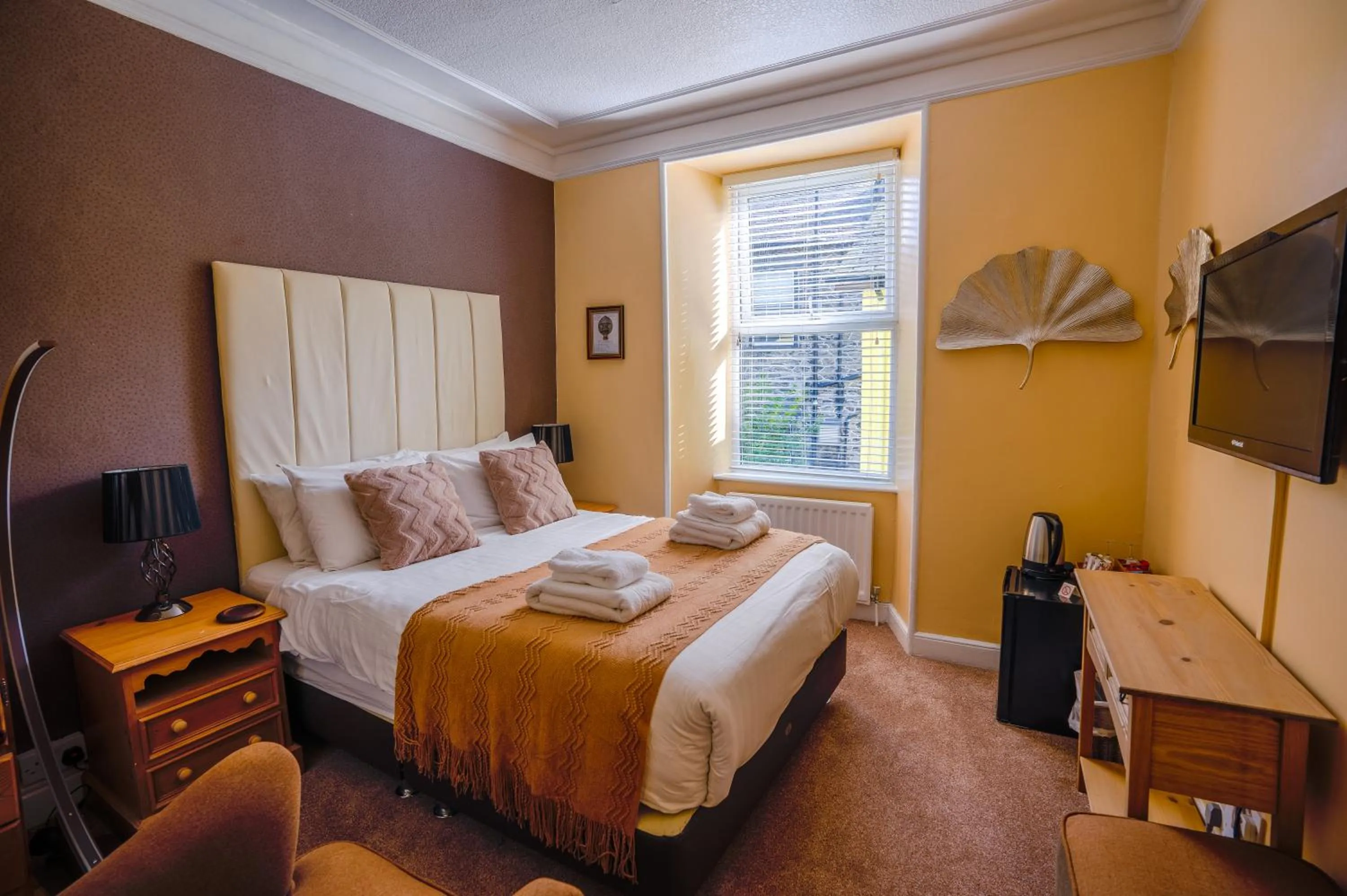 Photo of the whole room, Bed in The Cottage