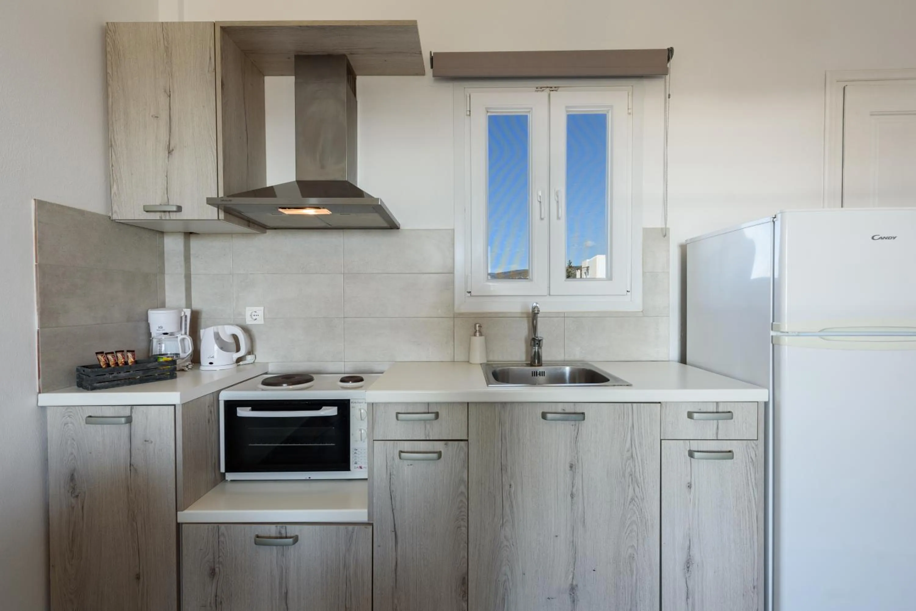 Kitchen or kitchenette in Anixis Studios Aliki Paros