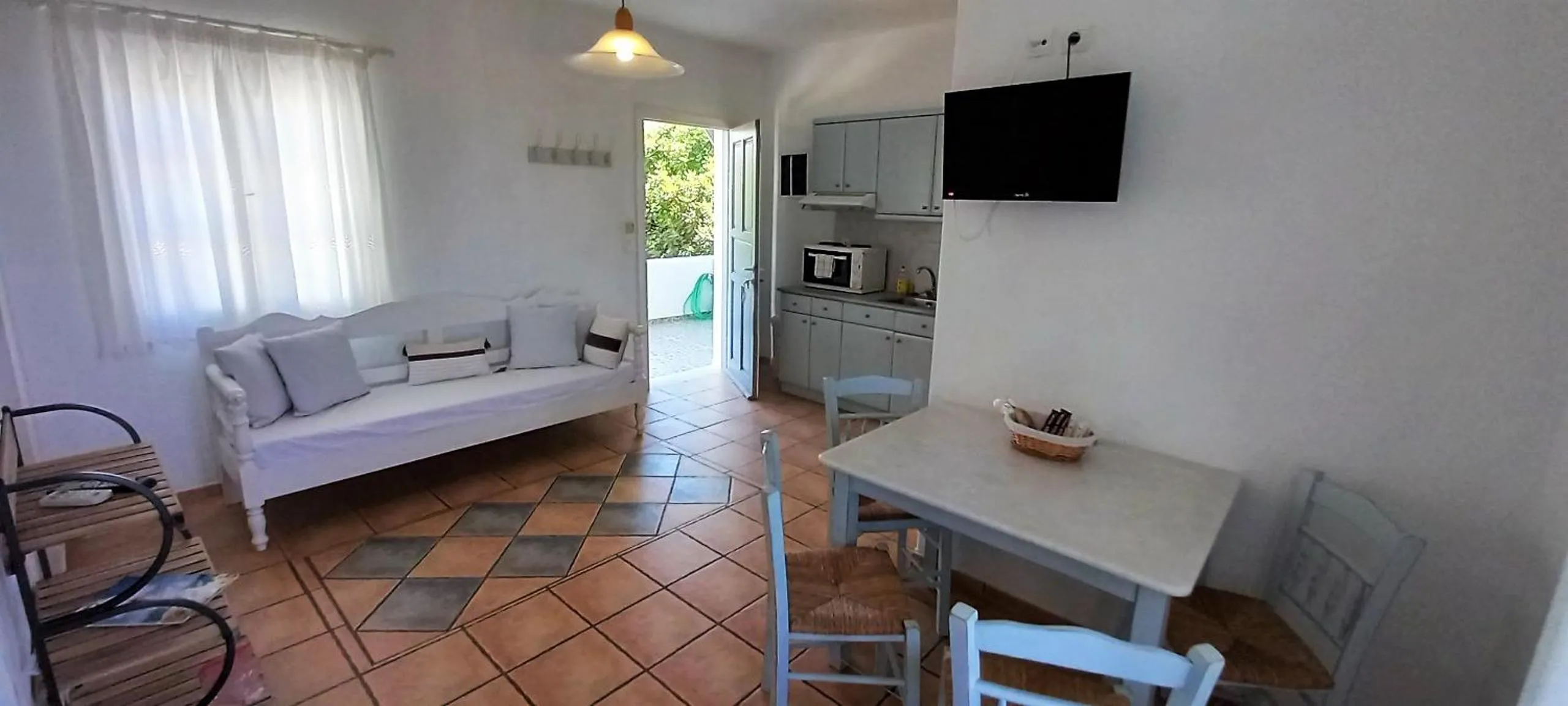 Seating area, Bed in Anixis Studios Aliki Paros