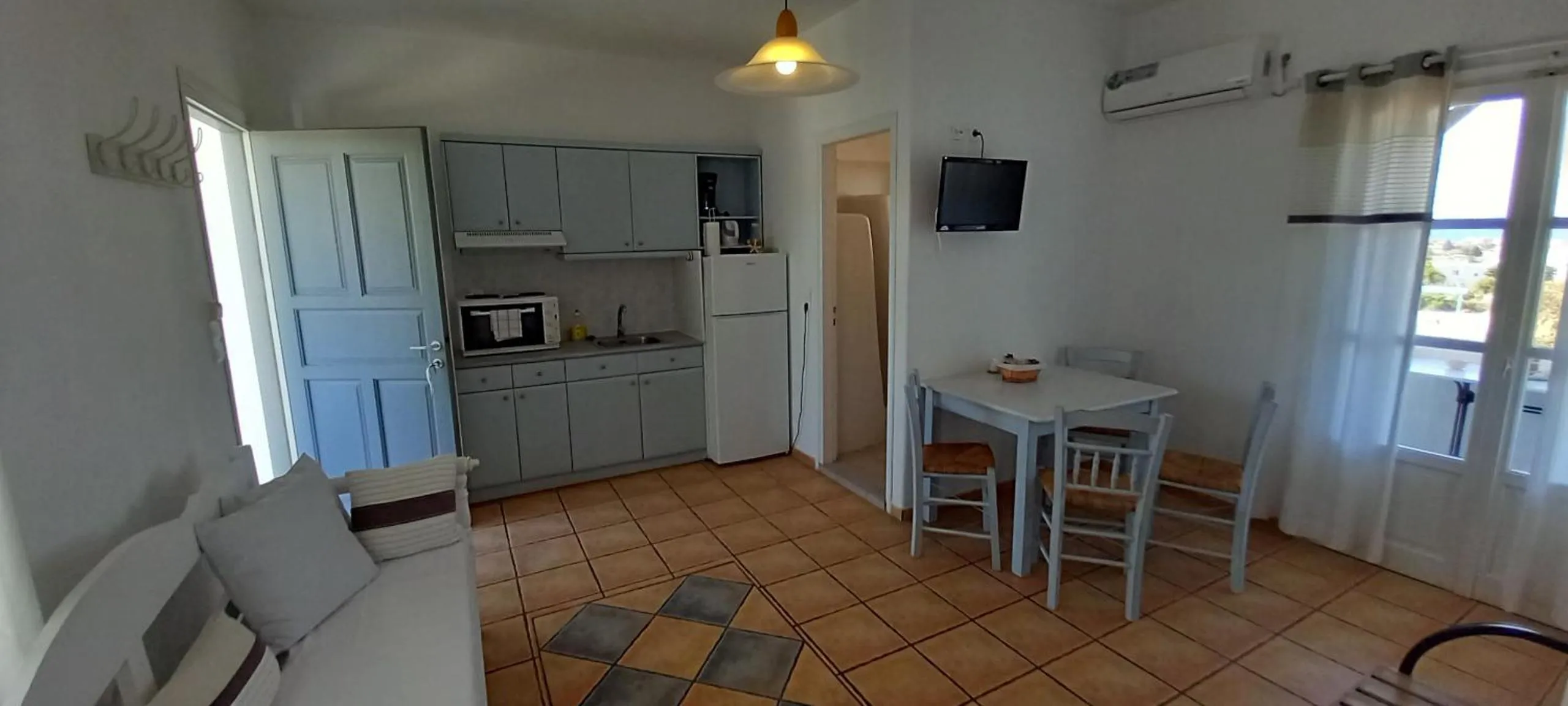 Kitchen or kitchenette in Anixis Studios Aliki Paros