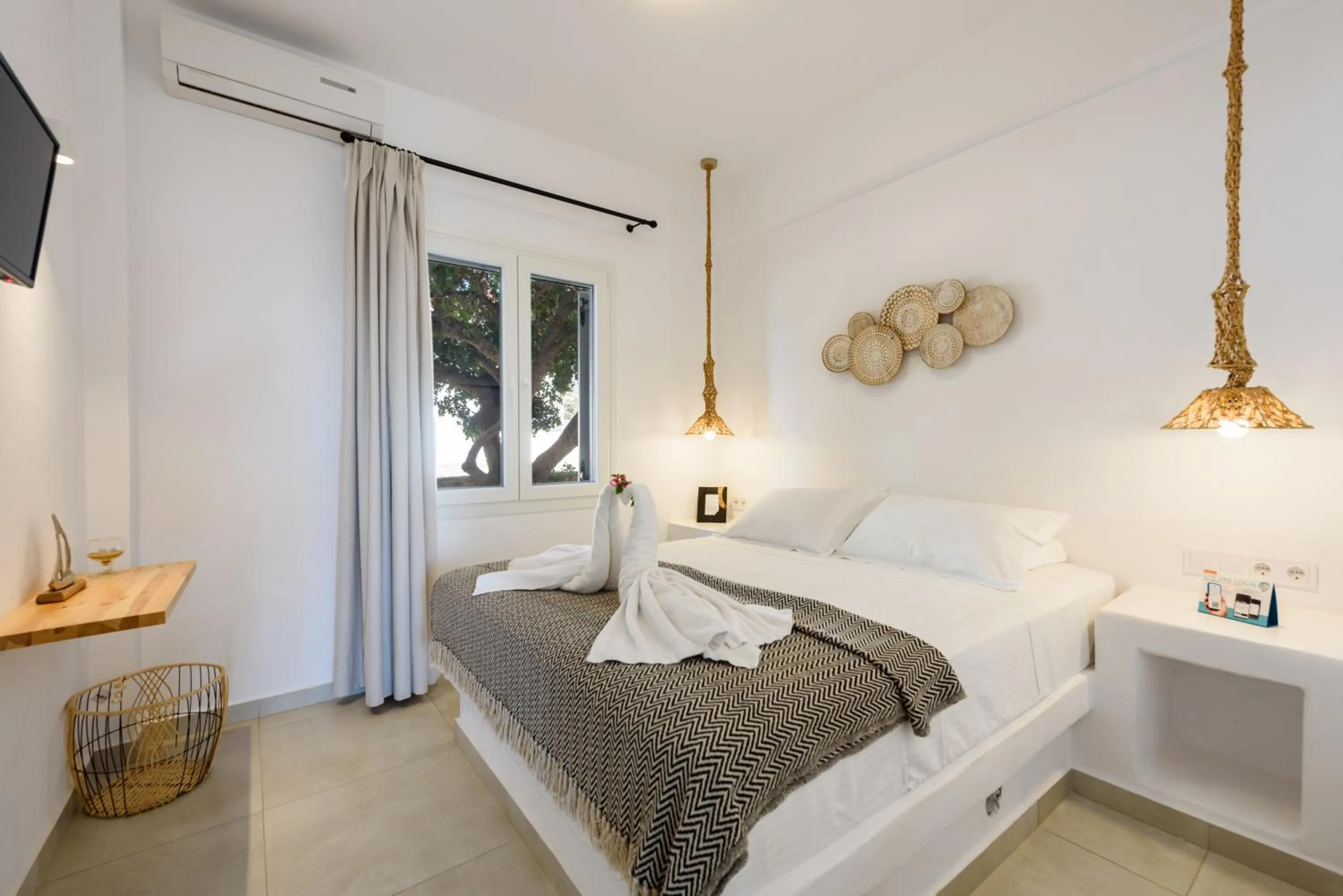 Bed in Anixis Studios Aliki Paros