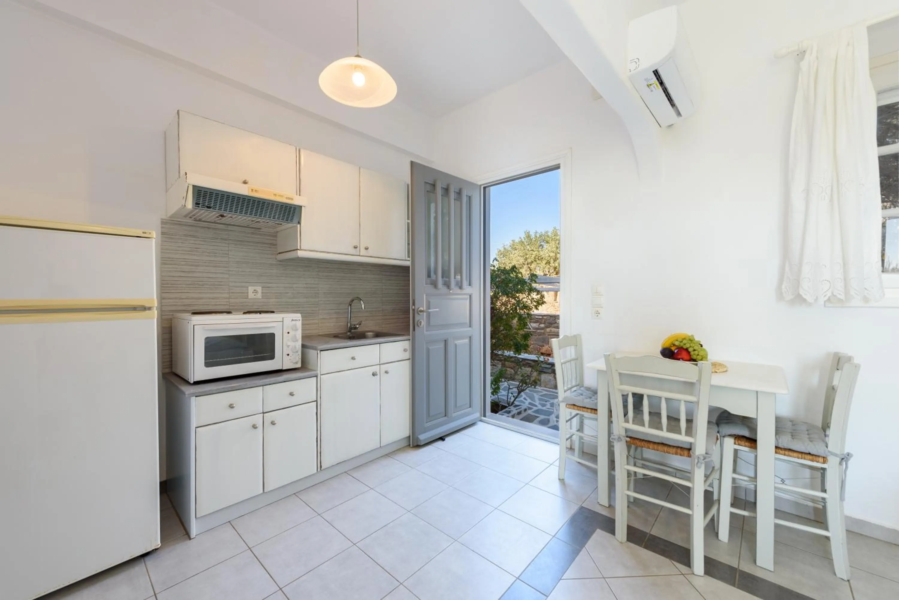 Dining area in Anixis Studios Aliki Paros