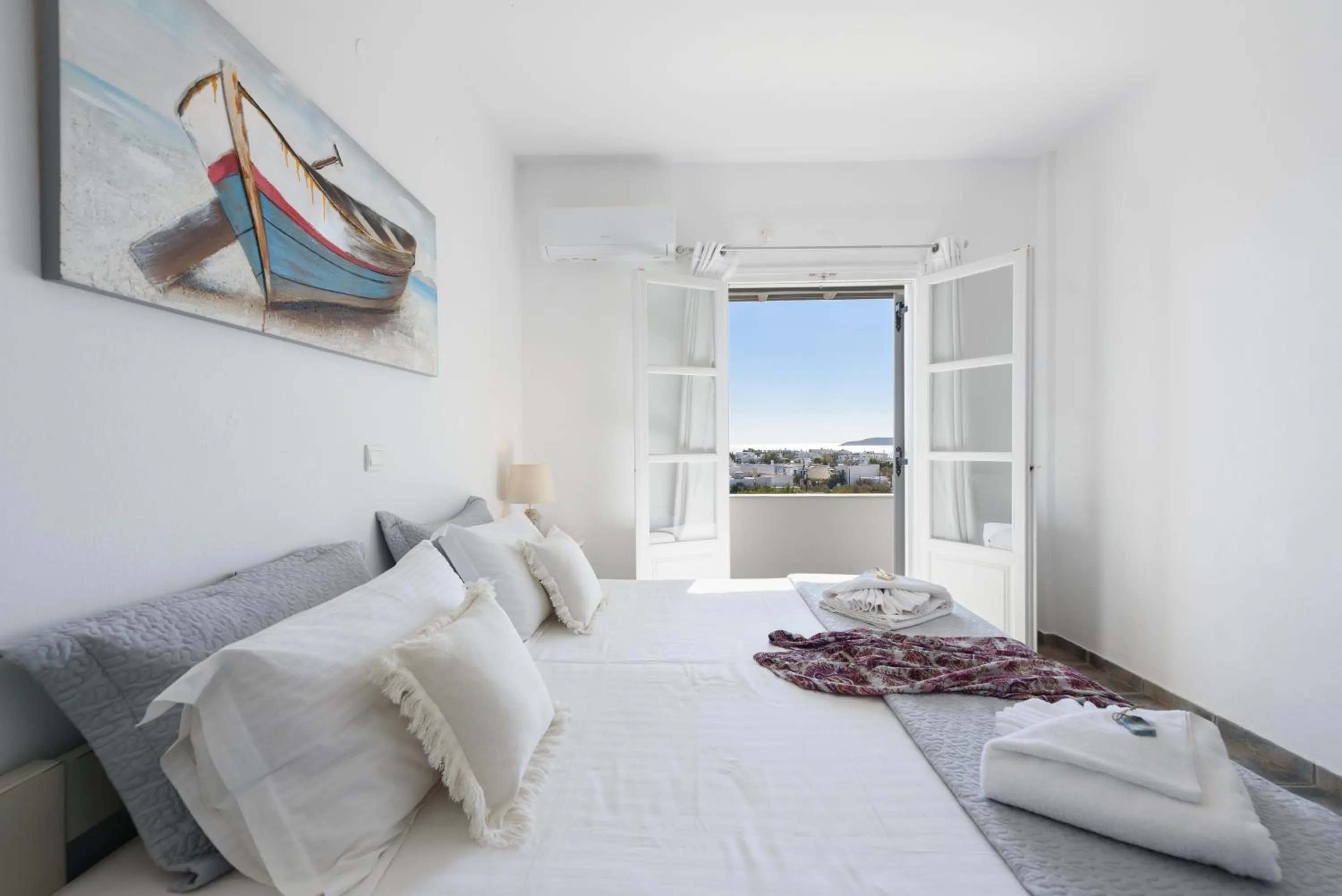 Bed in Anixis Studios Aliki Paros