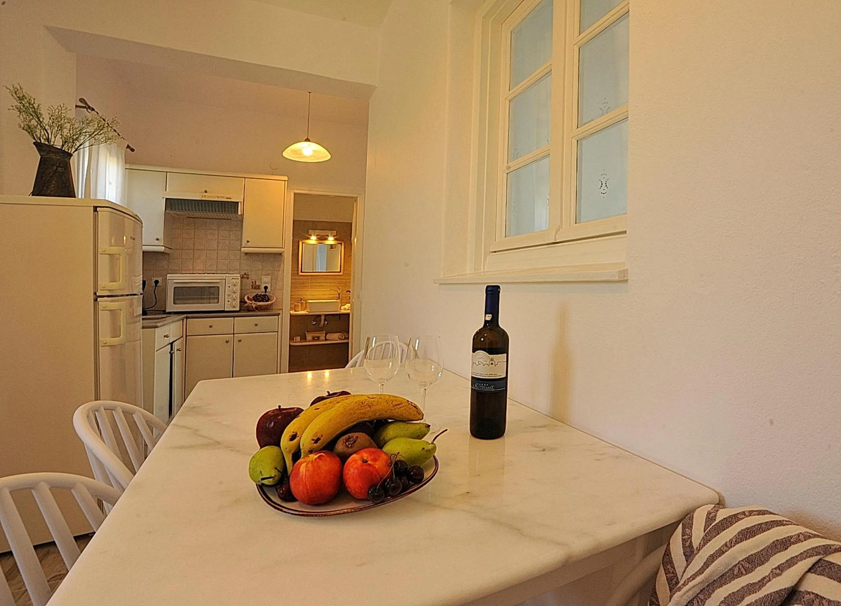 Kitchen or kitchenette in Anixis Studios Aliki Paros