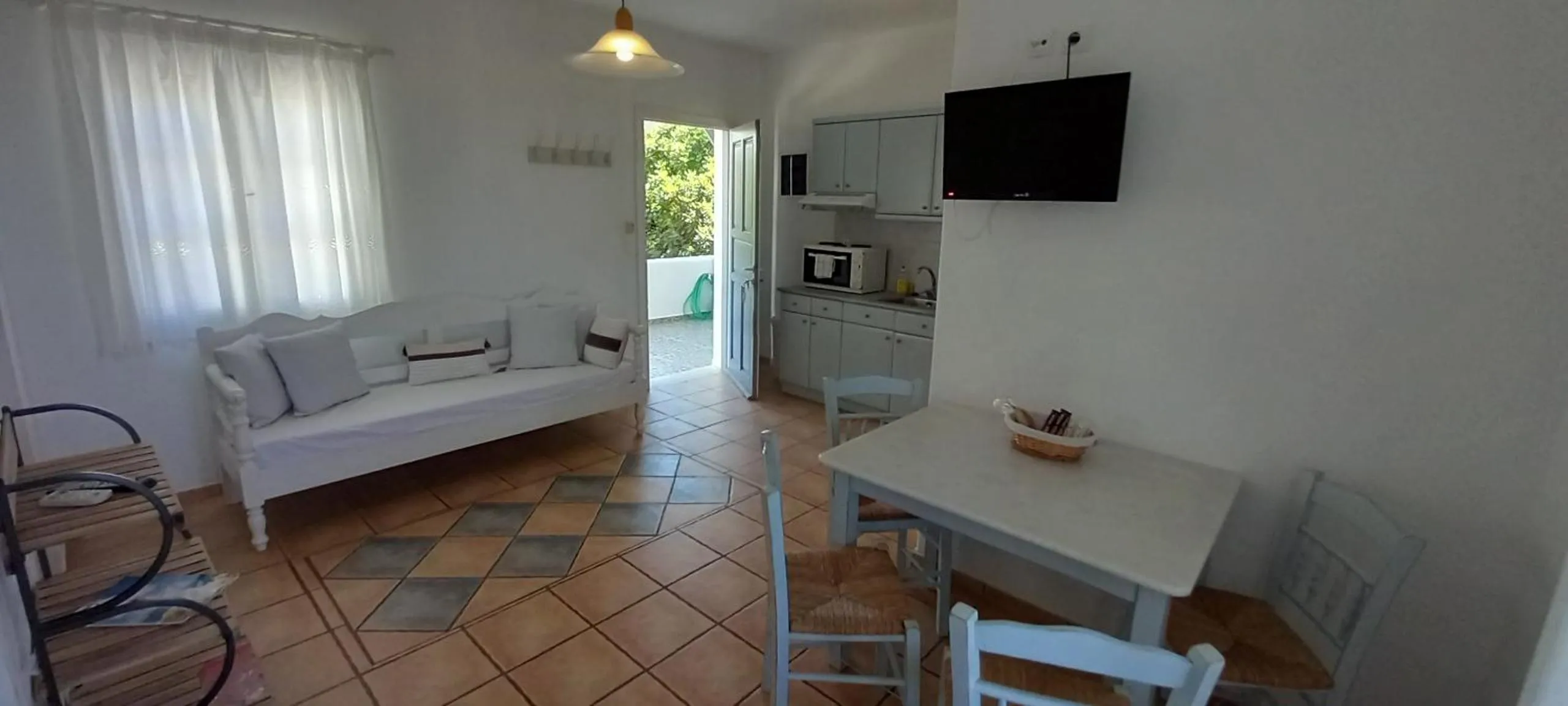 Kitchen or kitchenette, Bed in Anixis Studios Aliki Paros