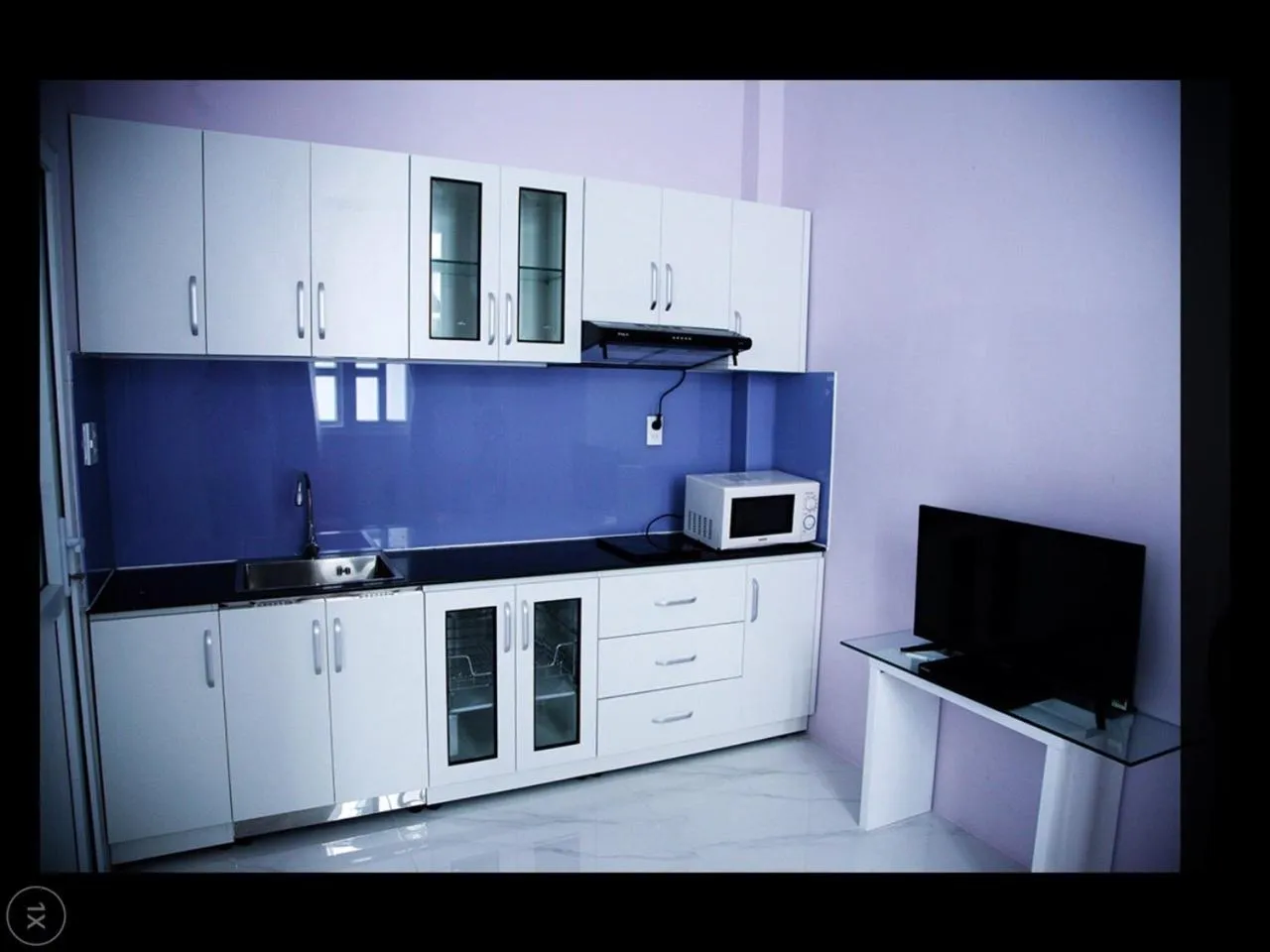 Kitchen or kitchenette in HT Hotel Apartment