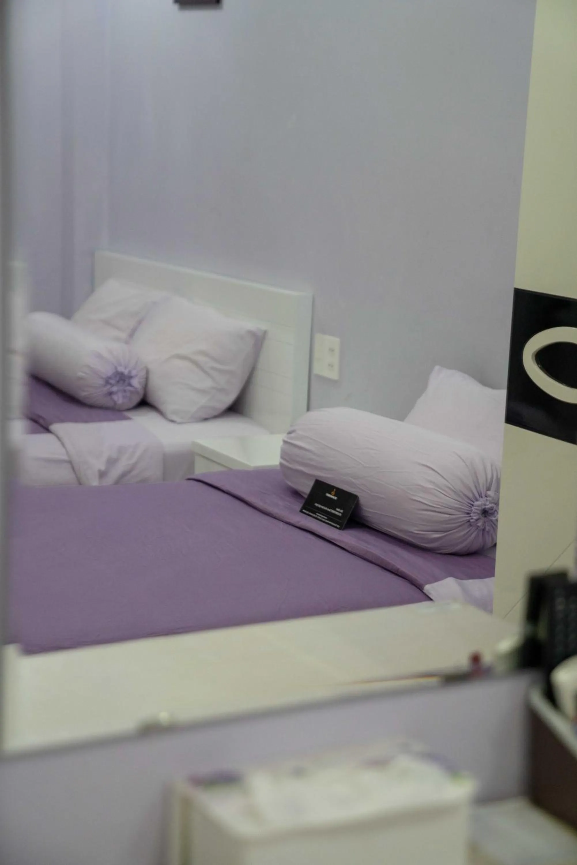 Bed in HT Hotel Apartment