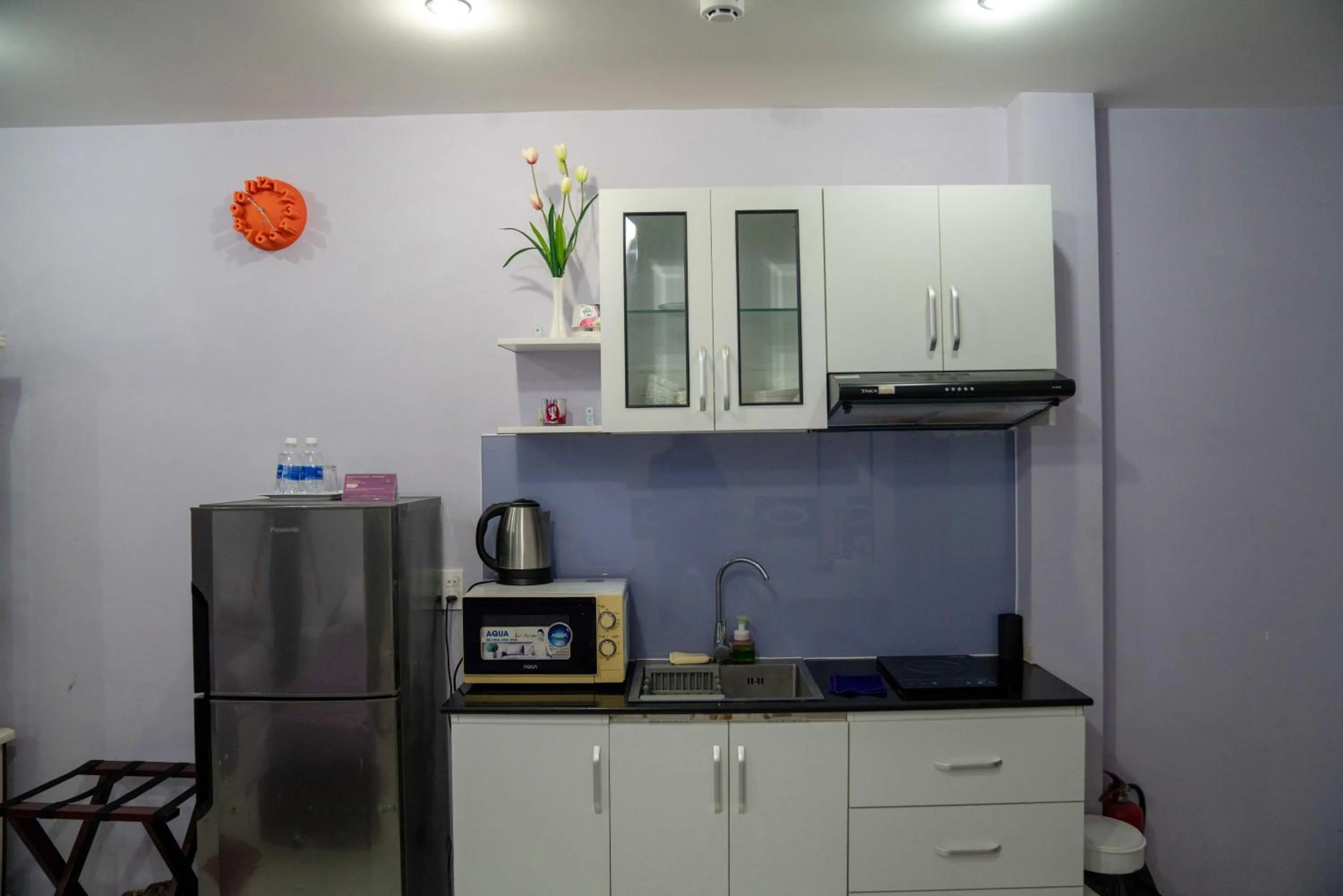 Kitchen or kitchenette in HT Hotel Apartment